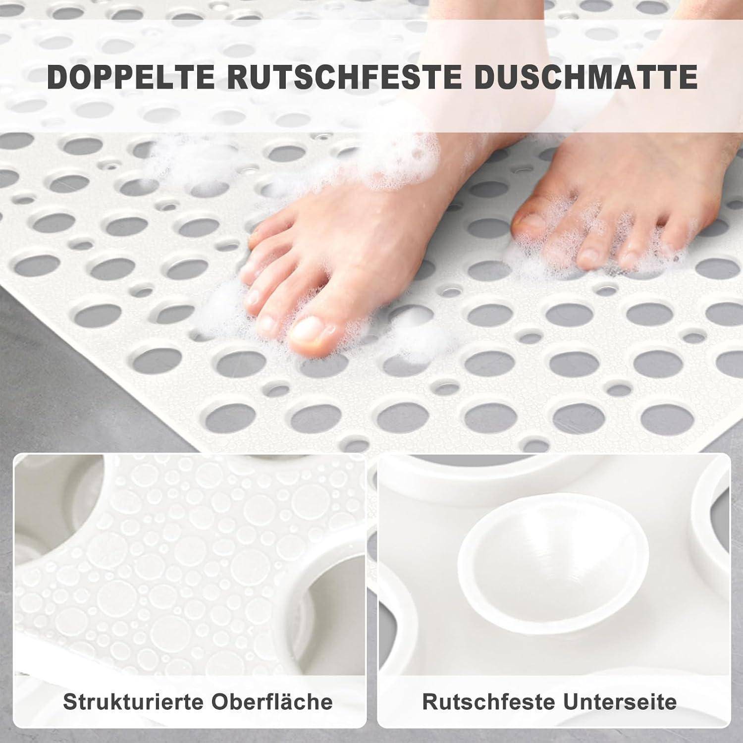 # Deutsches Inserat zeigt Füße auf einer doppelten rutschfesten Duschenmatte in einem nassen Badezimmer; Vergrößerungen mit den Etiketten 
