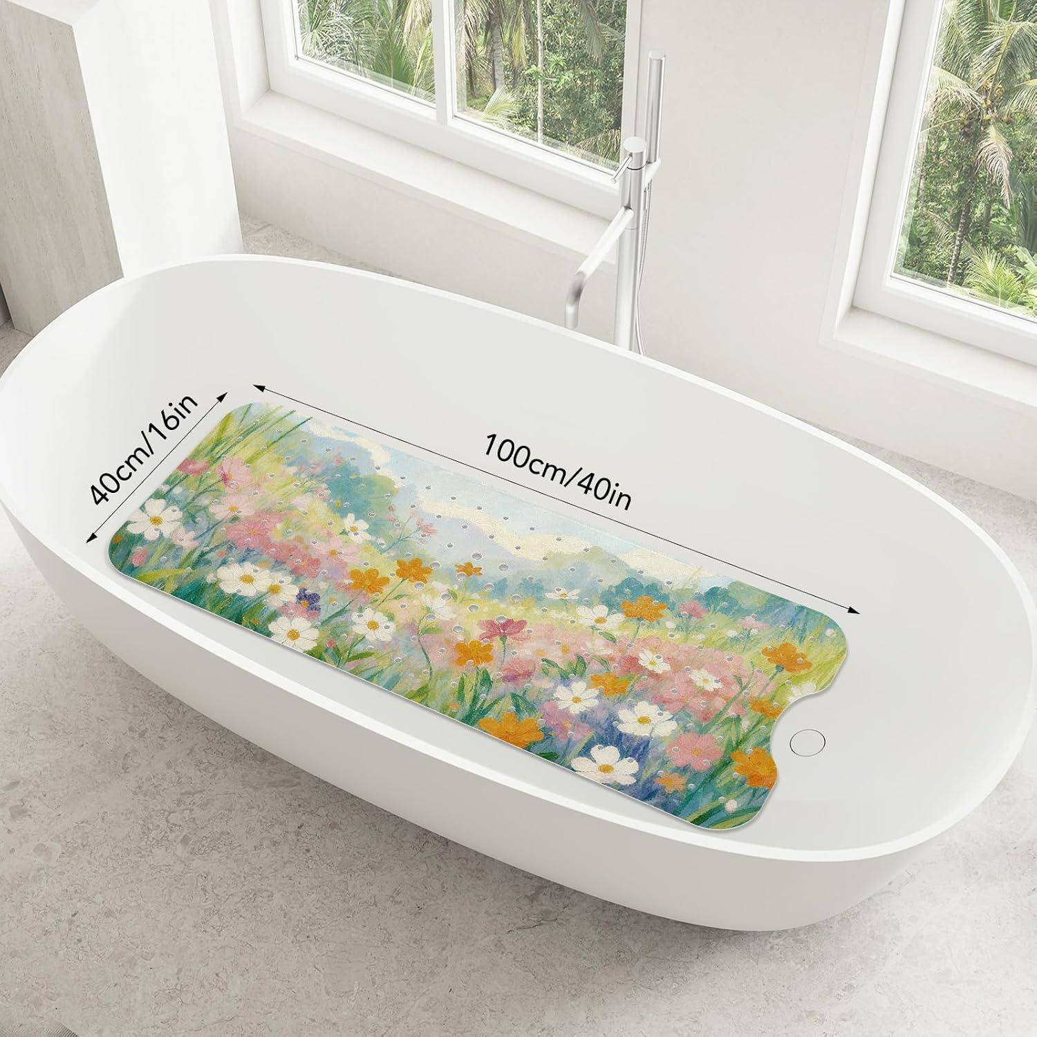 Ovale weiße Badewanne mit bunter floraler Badezimmermatte mit Einsatz, gekennzeichnet mit 100 cm/40 Zoll Länge und 40 cm/16 Zoll Breite.