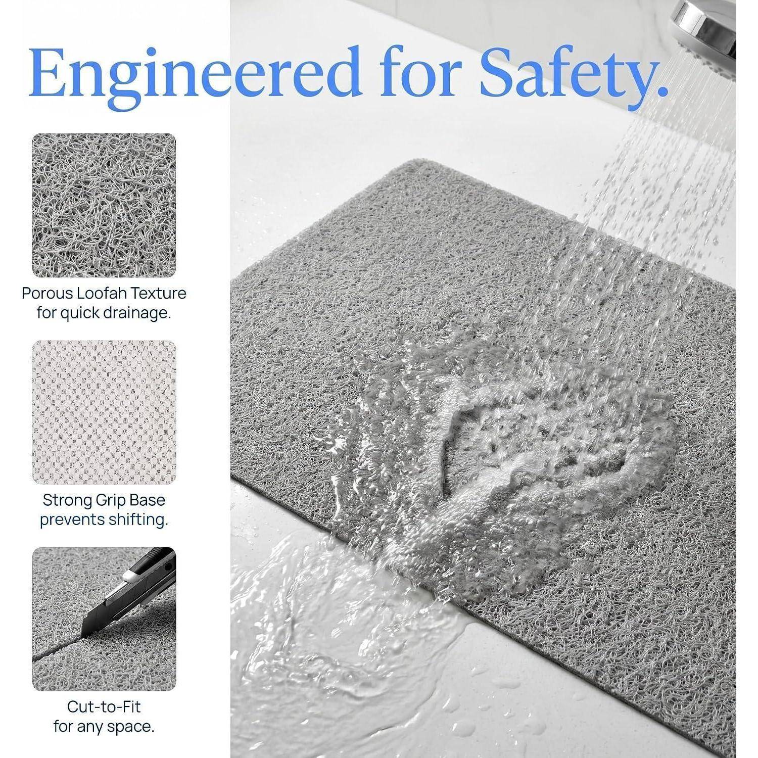 Anzeige für eine graue Sicherheitsmatte mit dem Text „Engineered for Safety." (Konstruiert für Sicherheit), die schnelle Entwässerung, eine rutschfeste Unterseite und ein zuschneidbares Design unter fließendem Wasser zeigt.