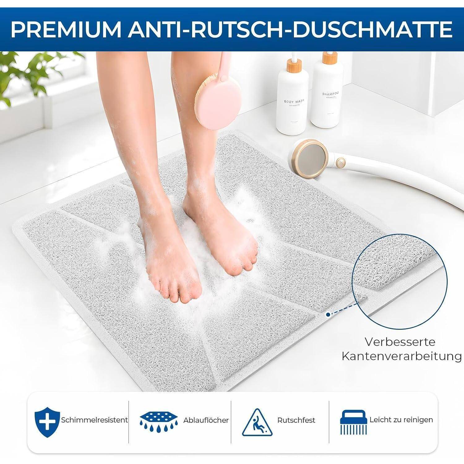 Premium-Antirutsch-Duschenmatte mit nassen Füßen auf einer strukturierten grauen Matte; Beschriftungen besagen schimmelresistent, Abflusslöcher, rutschfest, leicht zu reinigen und verbesserte Kantenfinish.