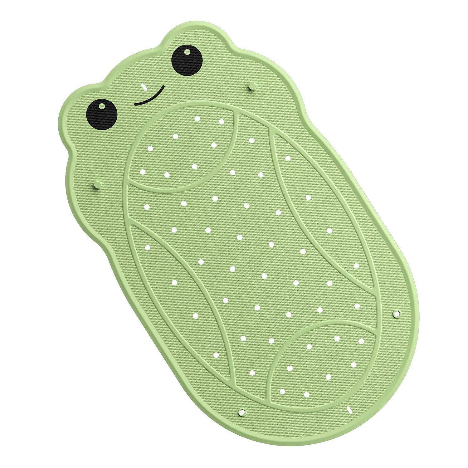 Grünes froschförmiges Brett oder Spielzeug mit großen schwarzen Augen, einem kleinen Lächeln und weißen gepunkteten Markierungen auf einem schlichten weißen Hintergrund.