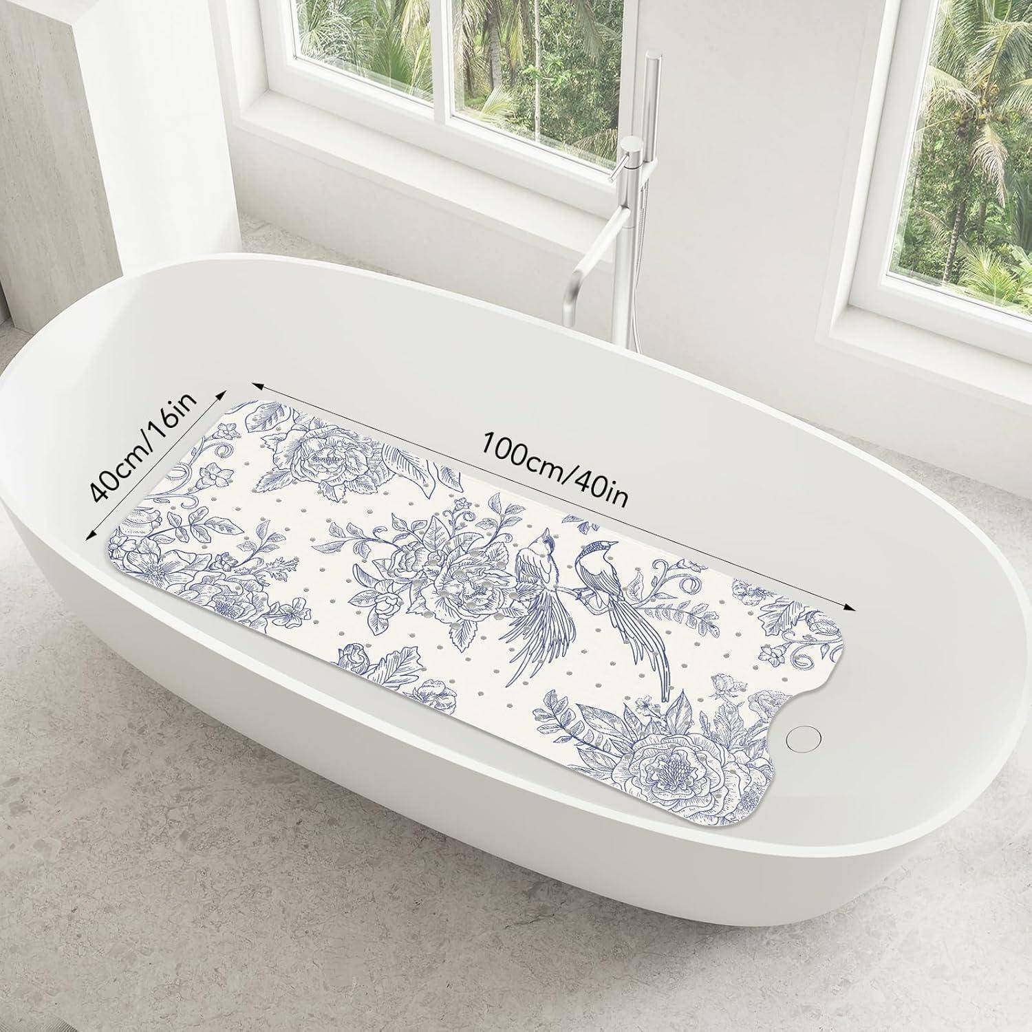 Weiße ovale Badewanne mit blauer Blumenmotiv-Antirutschmatte, dargestellt mit Größenangaben 100 cm/40 Zoll mal 40 cm/16 Zoll.