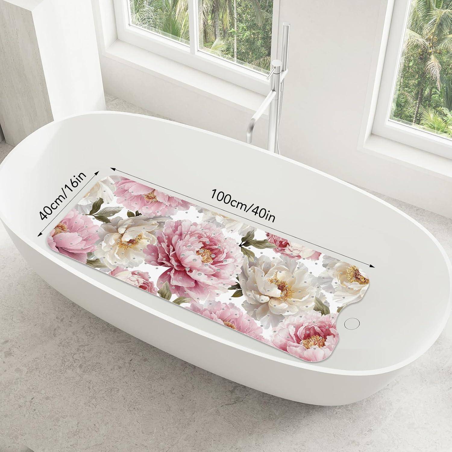 Freistehende weiße ovale Badewanne mit einer Blumenbadematte im Inneren, gekennzeichnet mit 100cm/40in Länge und 40cm/16in Breite.