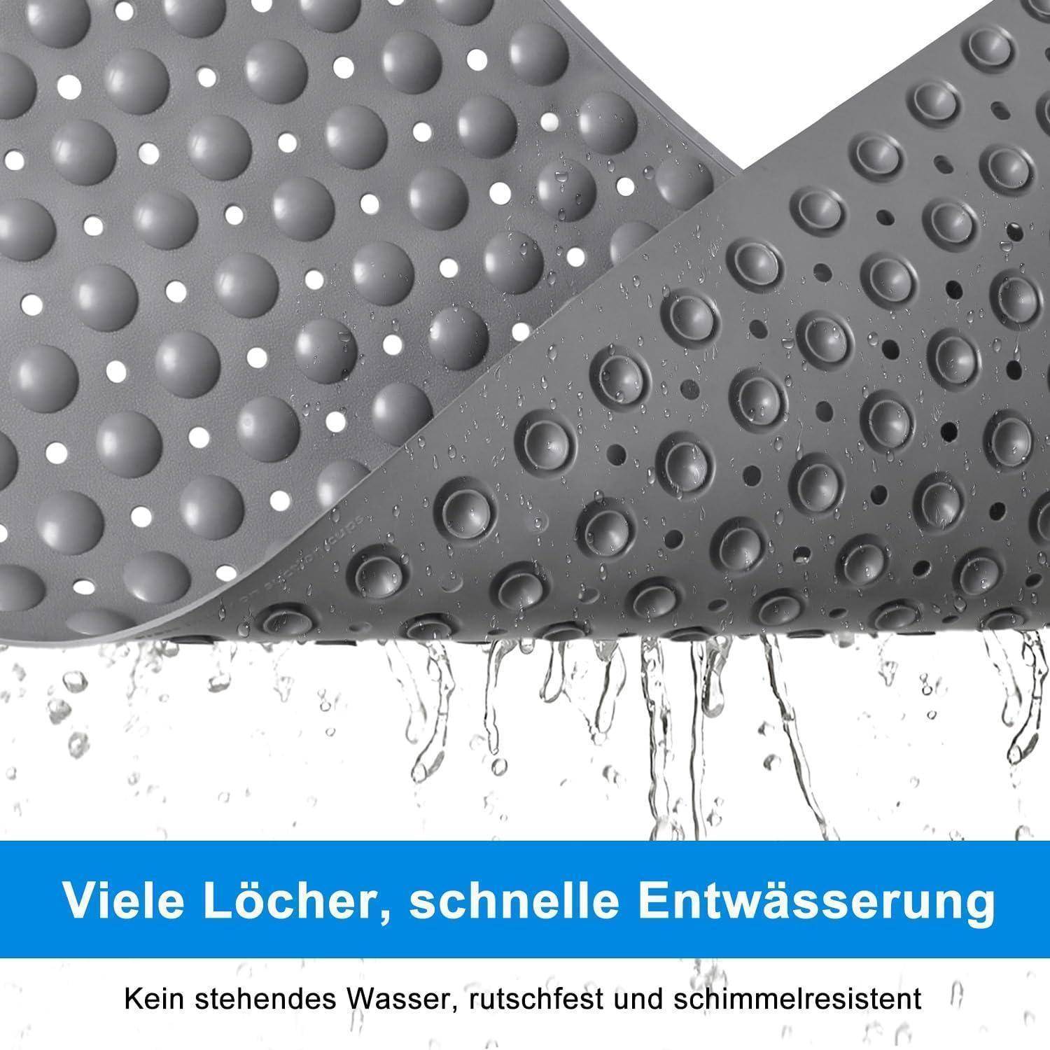Zwei überlappende graue Gummimatten mit erhabenen Noppen entwässern schnell Wasser; deutscher Text lautet „Viele Löcher, schnelle Entwässerung" und „Kein stehendes Wasser, rutschfest und schimmelresistent"".