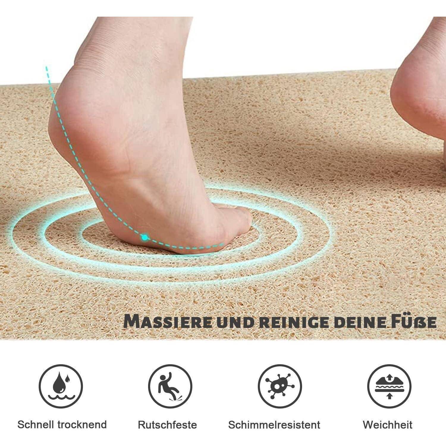 Barfüße drücken auf eine strukturierte Matte, mit Symbolen und deutscher Text, die schnelle Trocknung, rutschfeste Oberfläche, Schimmelresistenz und Weichheit fördern.