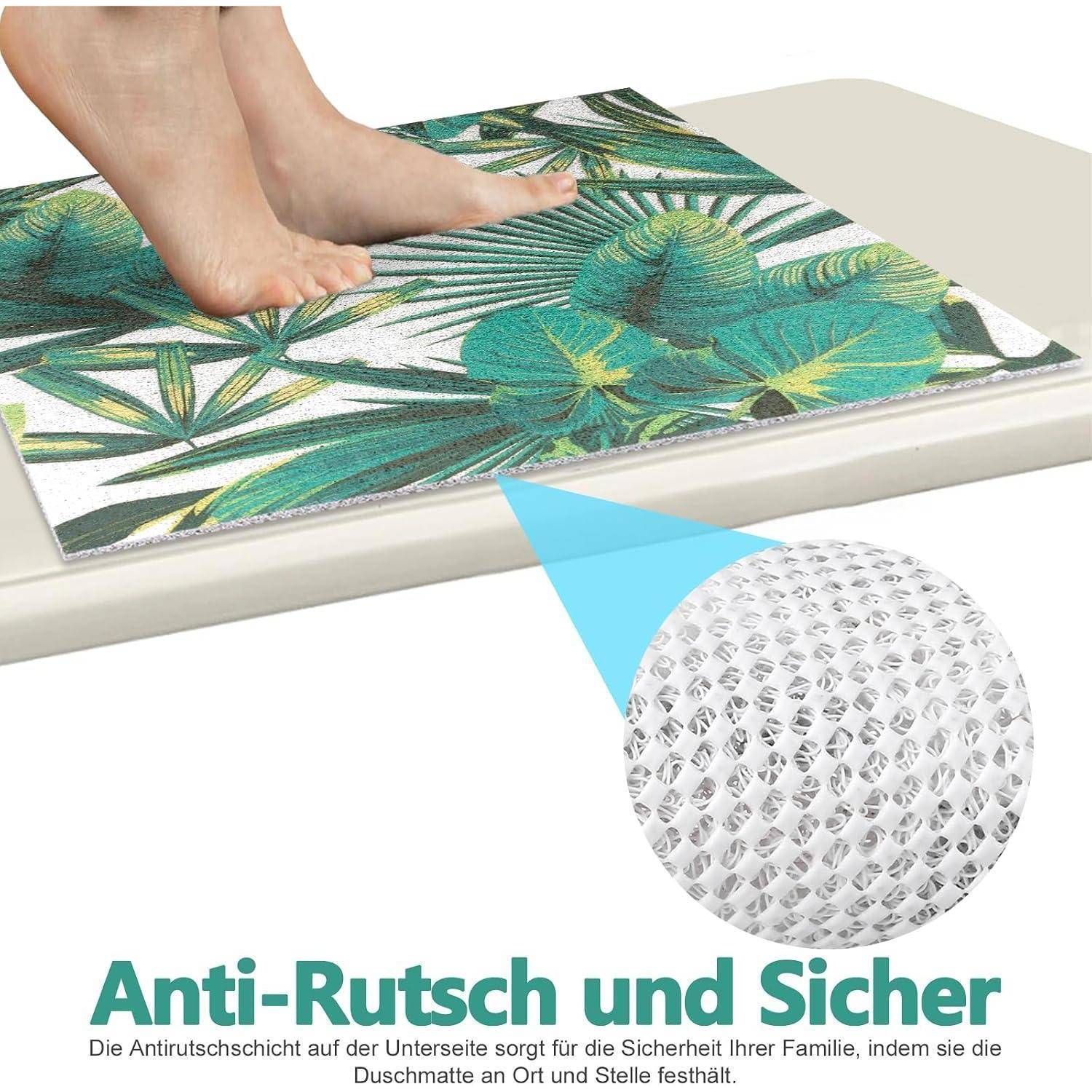 Nackte Füße stehen auf einer gemusterten Badematte; eine Detailansicht zeigt die strukturierte rutschfeste Rückseite. Der Text lautet „Anti-Rutsch und Sicher