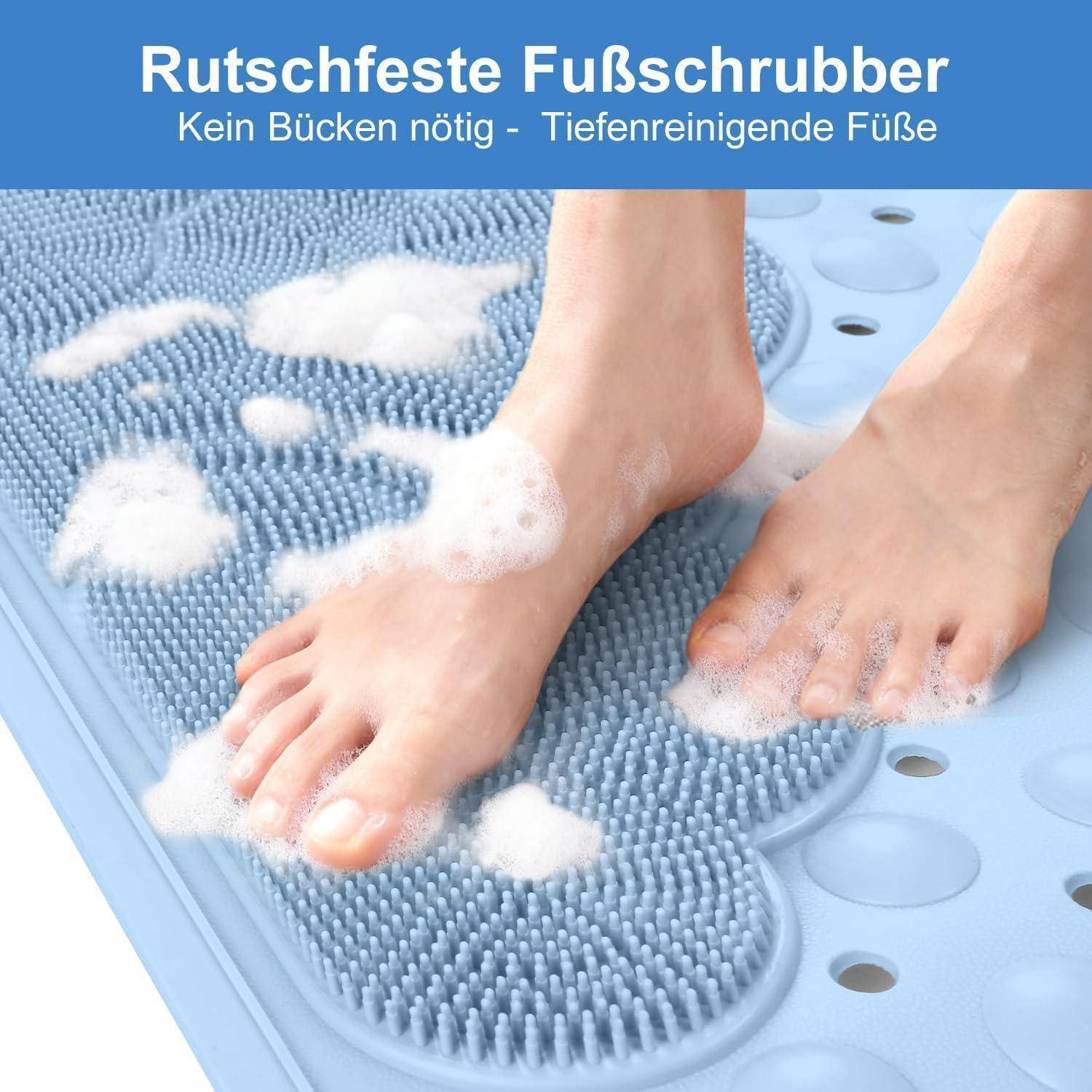 Fußschrubmatte mit Füßen und Seifenschaum; deutscher Text sagt „Rutschfeste Fußschrubber