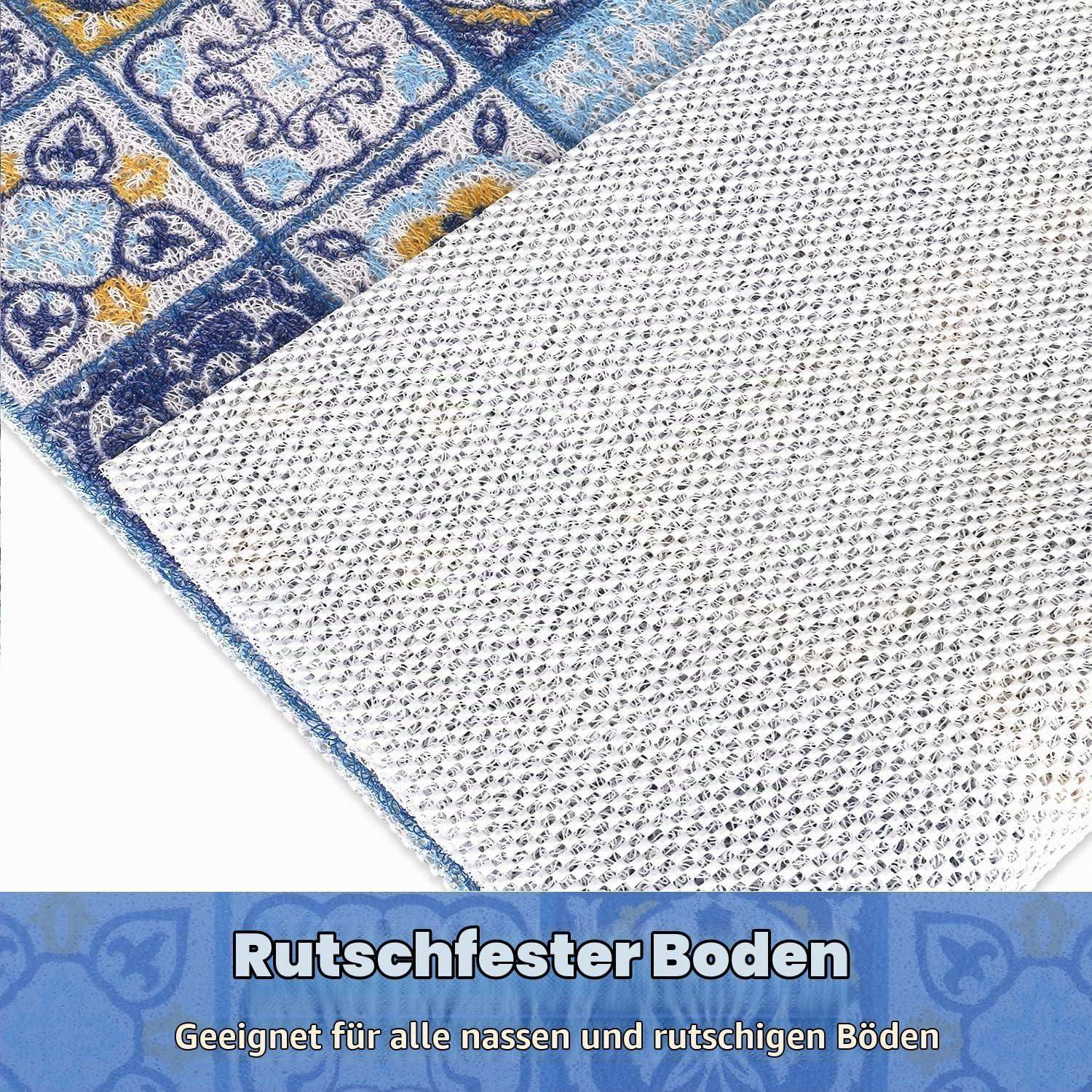 Strukturierte rutschfeste Teppichrückseite mit deutschem Text „Rutschfester Boden" und „Geeignet für alle nassen und rutschigen Böden"", die eine bodensichere Matte anzeigt.