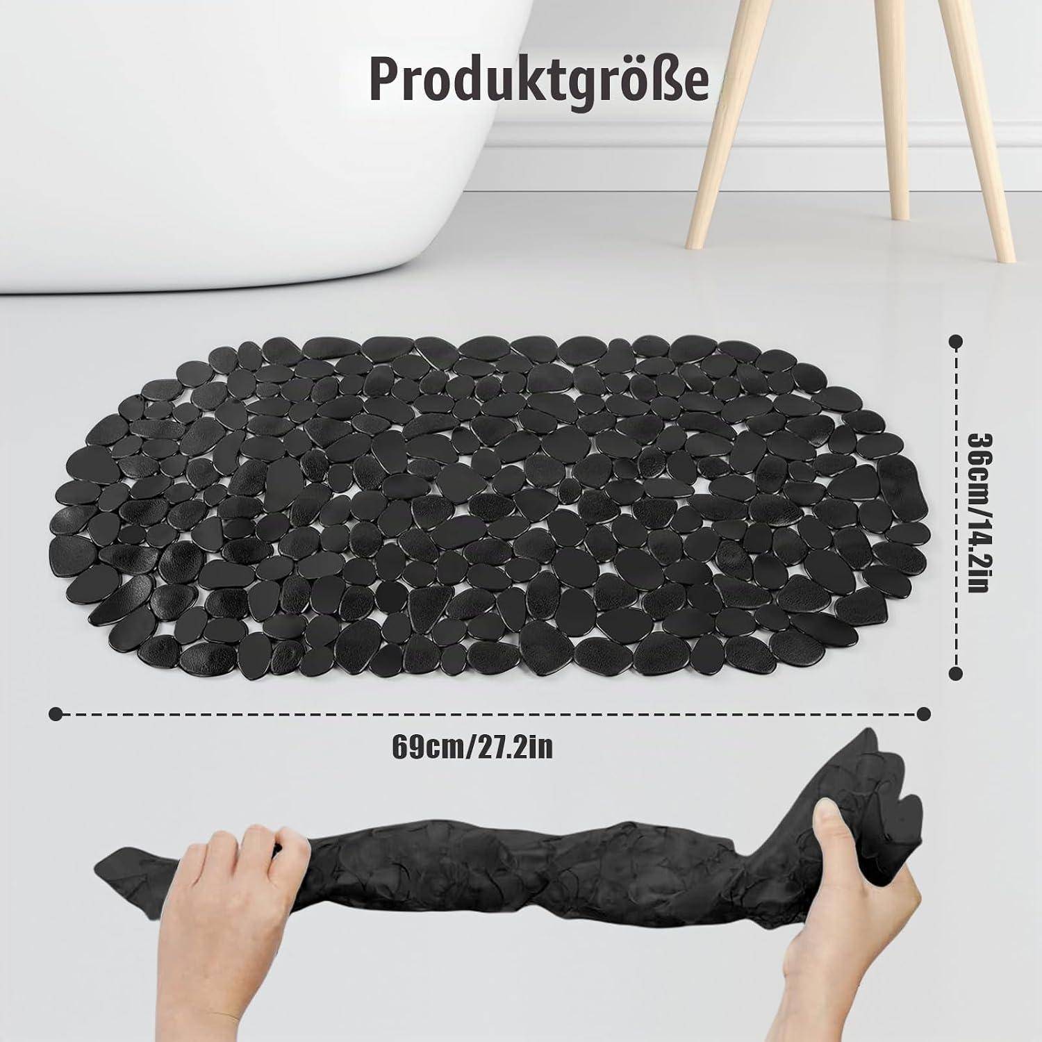 Produktgrößen-Grafik für eine schwarze Kieselstein-Stil-Matte: 69 cm x 36 cm, dargestellt mit Händen, die sie aufrollen.