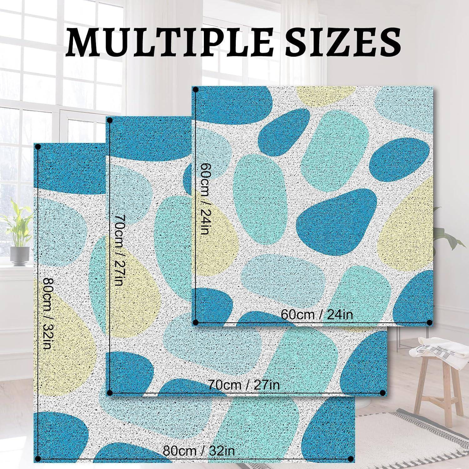 Produktbild mit abstrakten Teppichen in Blau-, Teal- und Cremetönen mit Kieselmuster in verschiedenen Größen, beschriftet mit 60cm/24in, 70cm/27in und 80cm/32in.