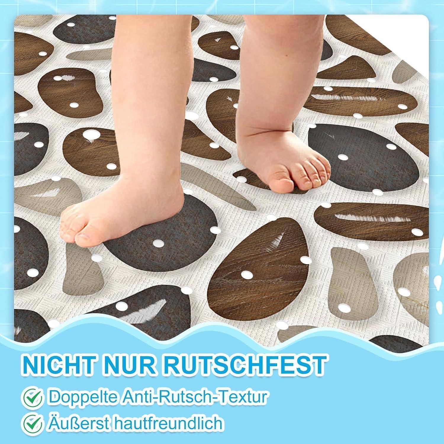 Babyfüße stehen auf einer rutschfesten Matte mit braun-grauem Kieselsteinmuster; deutscher Text bewirbt „Doppelte Anti-Rutsch-Textur