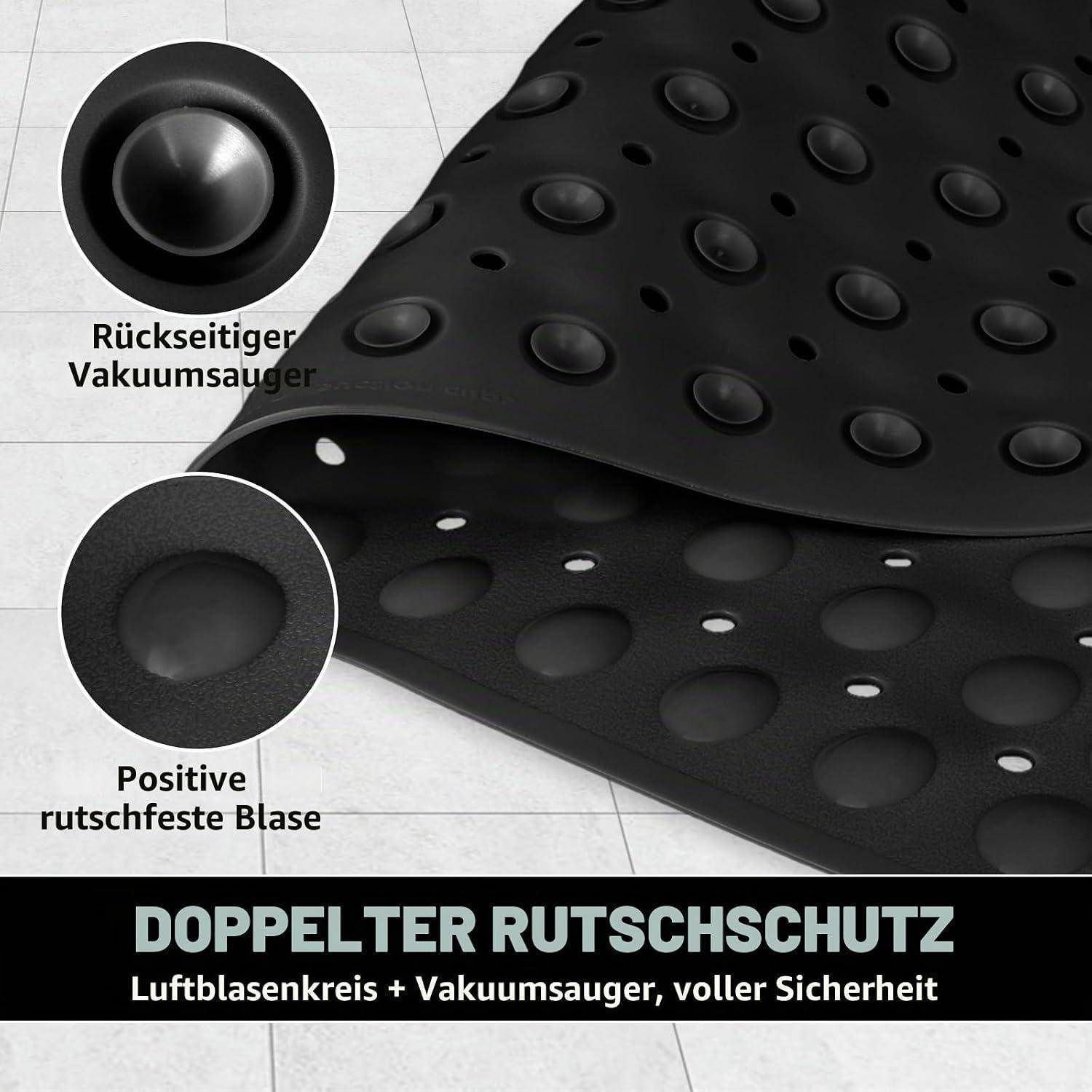 Schwarze Antirutschmatte mit erhabenen Saugnapfern und Luftbläschen, gekennzeichnet mit „Doppelter Rutschschutz