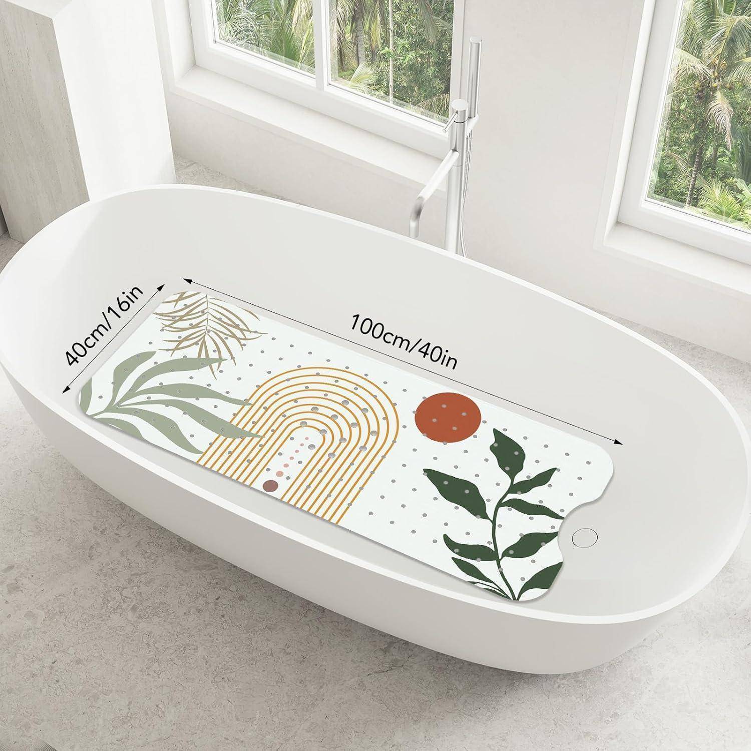 Weiße ovale Badewanne mit einer farbenfrohen 100 cm x 40 cm großen Dekorationsmatte mit Blättern, Sonne und Regenbogen-Design.