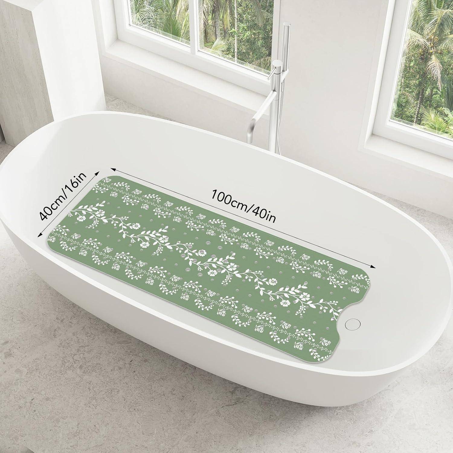 Grüne Badewannenmatte mit floralen Mustern und gerundeten Enden, in einer weißen Badewanne gezeigt; gekennzeichnet mit 100 cm/40 Zoll Länge und 40 cm/16 Zoll Breite.