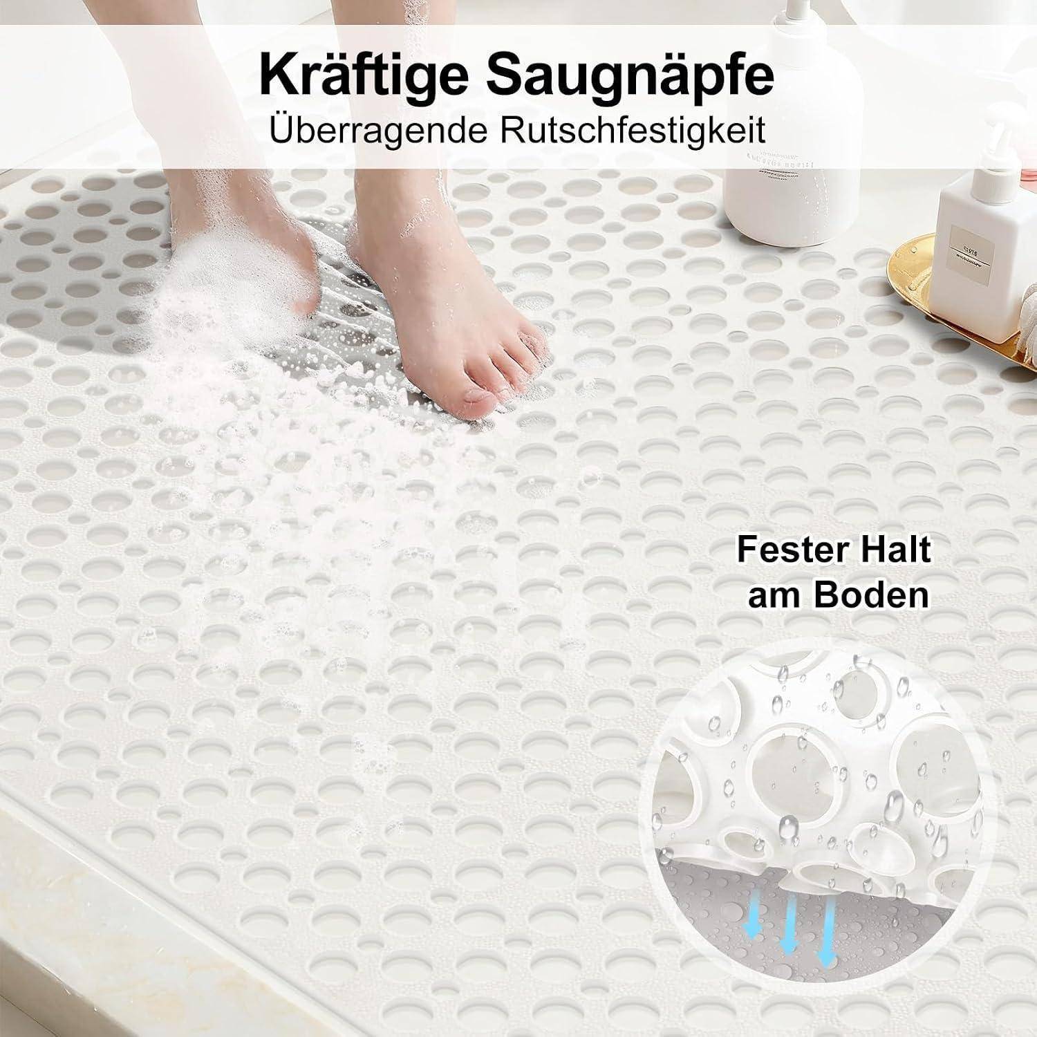 Badezimmermatte mit Saugnapfen und nassen Füßen; Deutscher Text besagt „Kräftige Saugnäpfe