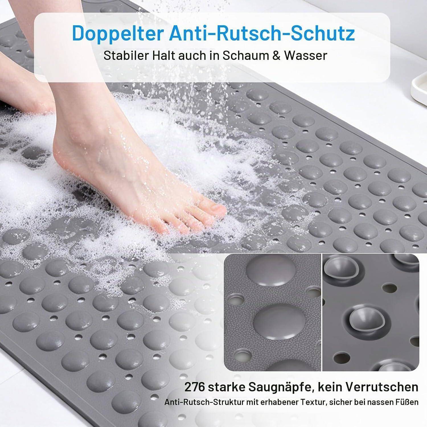 Rutschfeste Badmatte mit Saugnäpfen, unter fließendem Wasser gezeigt; deutscher Text sagt „doppelter Rutschschutz