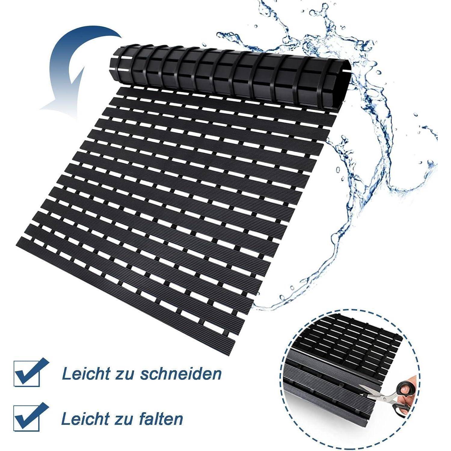 Aufrollbare schwarze Lamellenmatte wird mit Wasser gereinigt; deutscher Text sagt „Leicht zu schneiden