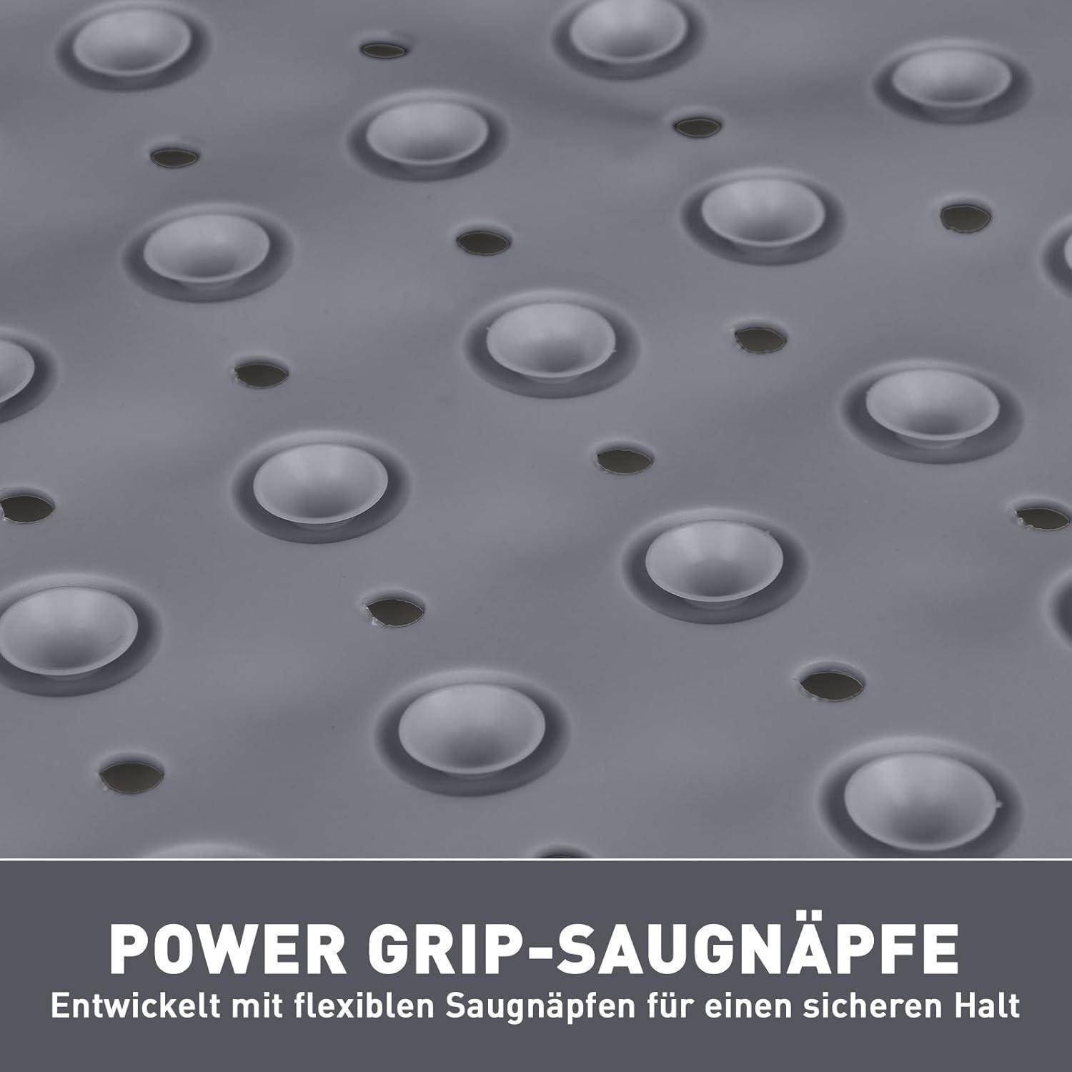 Graue strukturierte Oberfläche mit erhabenen Saugnäpfen; Text lautet „POWER GRIP-SAUGNÄPFE