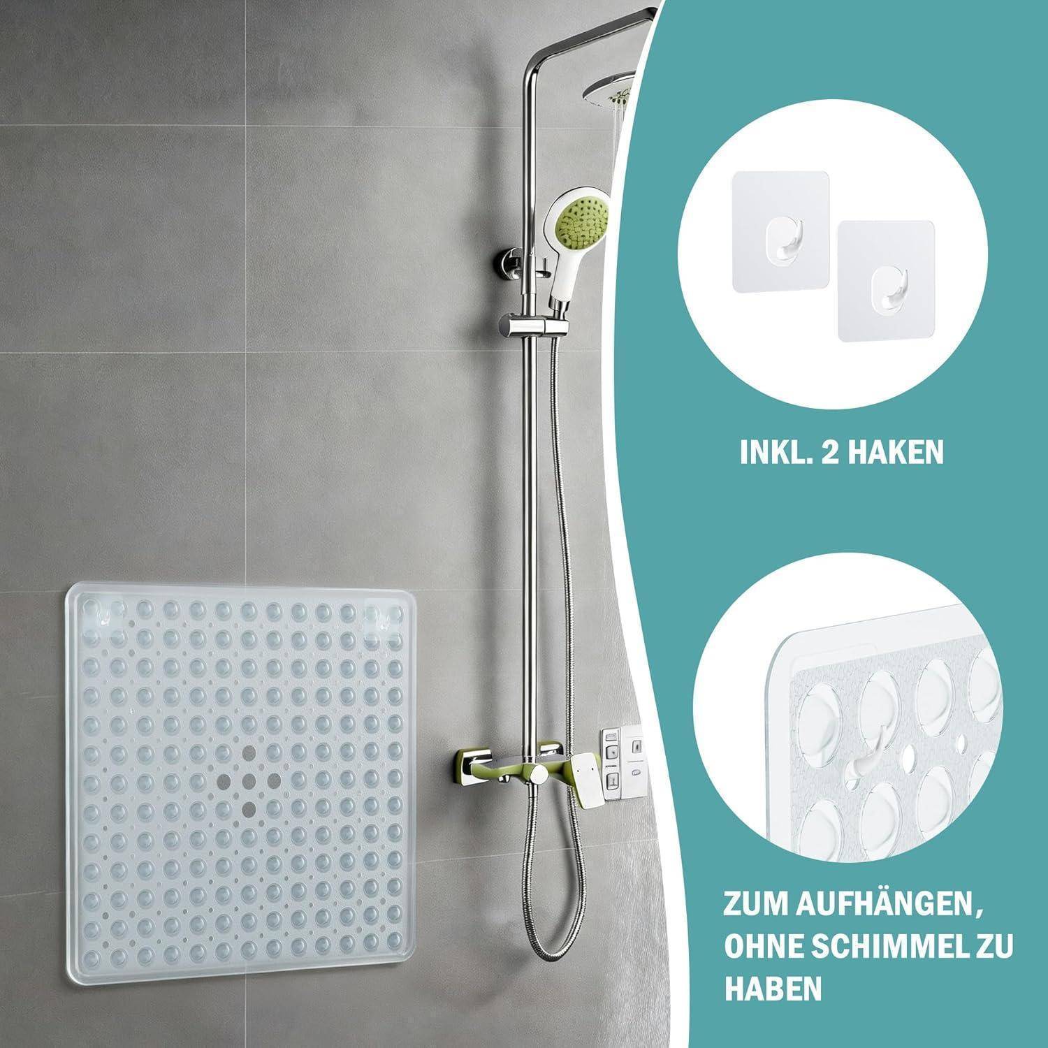 Badezimmer-Duschvorleger an einer gekachelten Wand montiert, mit mitgelieferten Haken; Text besagt „INKL. 2 HAKEN