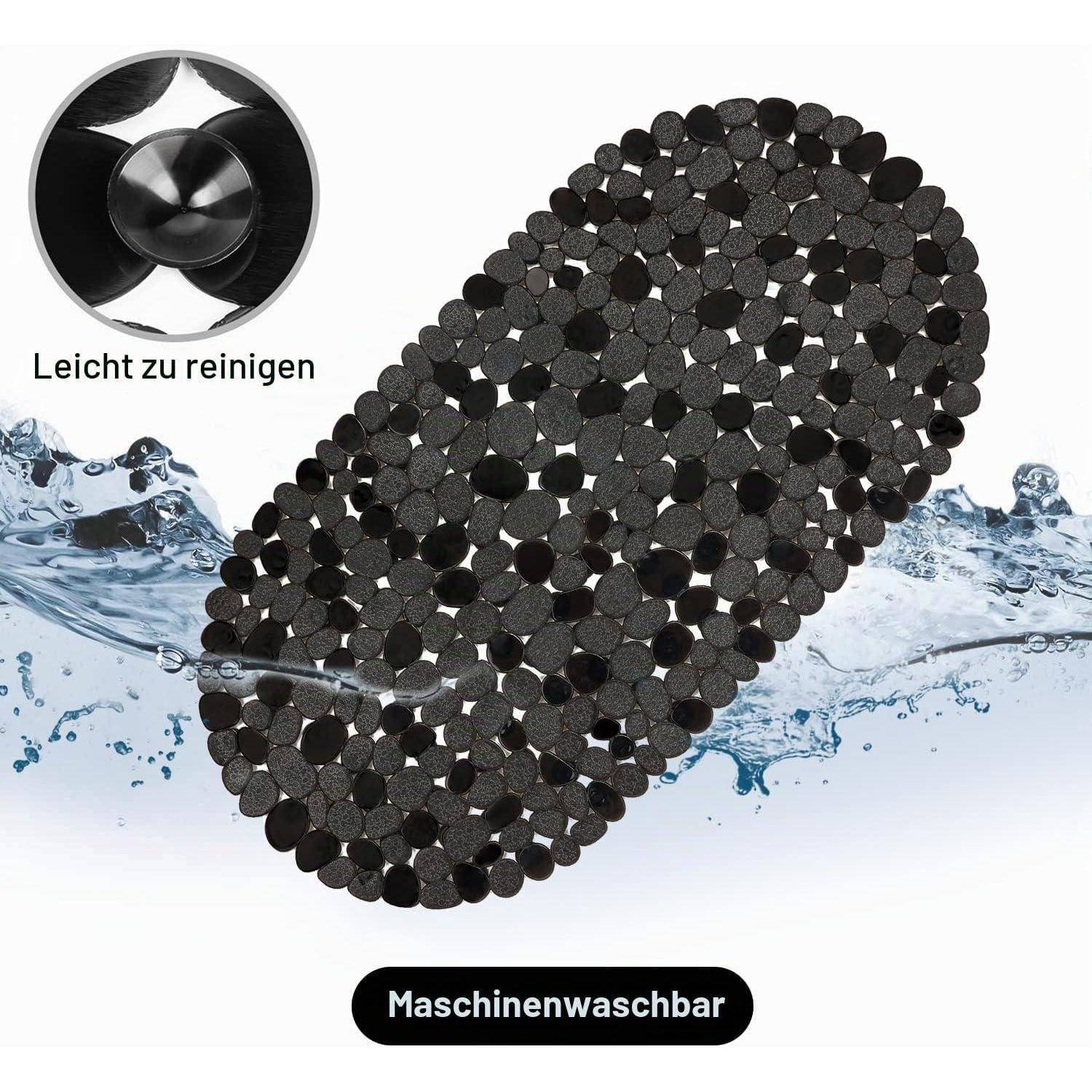Schwarze strukturierte Badezimmermatte mit Wasserspritzer gezeigt, beschriftet mit „Leicht zu reinigen" und „Maschinenwaschbar"", um einfache Reinigung und Maschinenwaschbarkeit anzuzeigen.