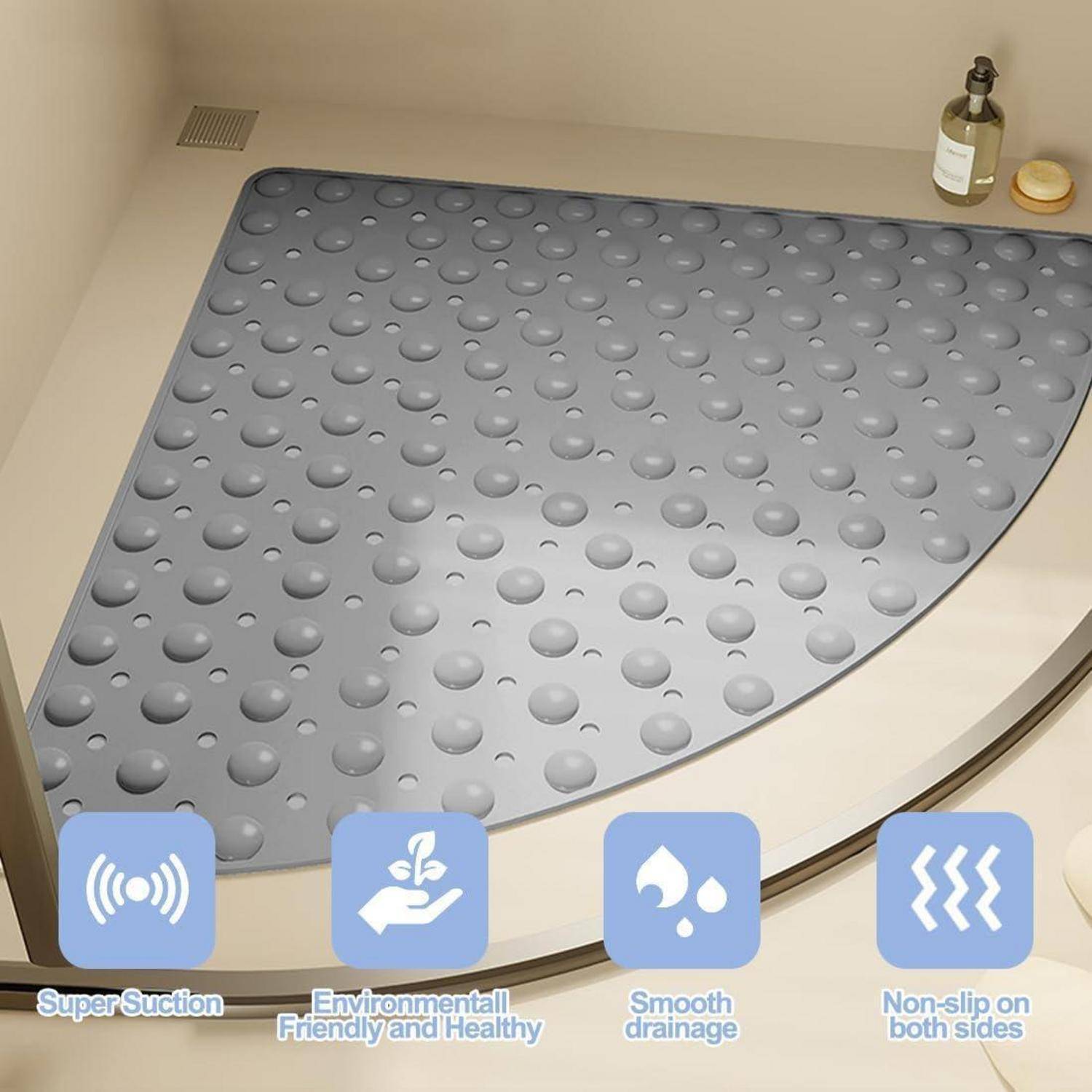Strukturierte graue rutschfeste Badewannenmatte in einer Eckenwanne, dargestellt mit Symbolen, die starke Saugkraft, umweltfreundliches Material, problemlose Drainage und rutschfest auf beiden Seiten hervorheben.