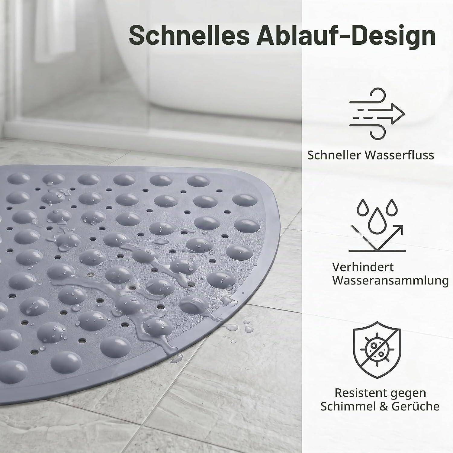 Graue Duschenmatte mit Ablauflöchern und Wassertropfen, beschriftet mit „Schnelles Ablauf-Design" mit Symbolen für schnelle Wasserableitung, keine Wasseransammlung und Schimmel- und Geruchsbeständigkeit.