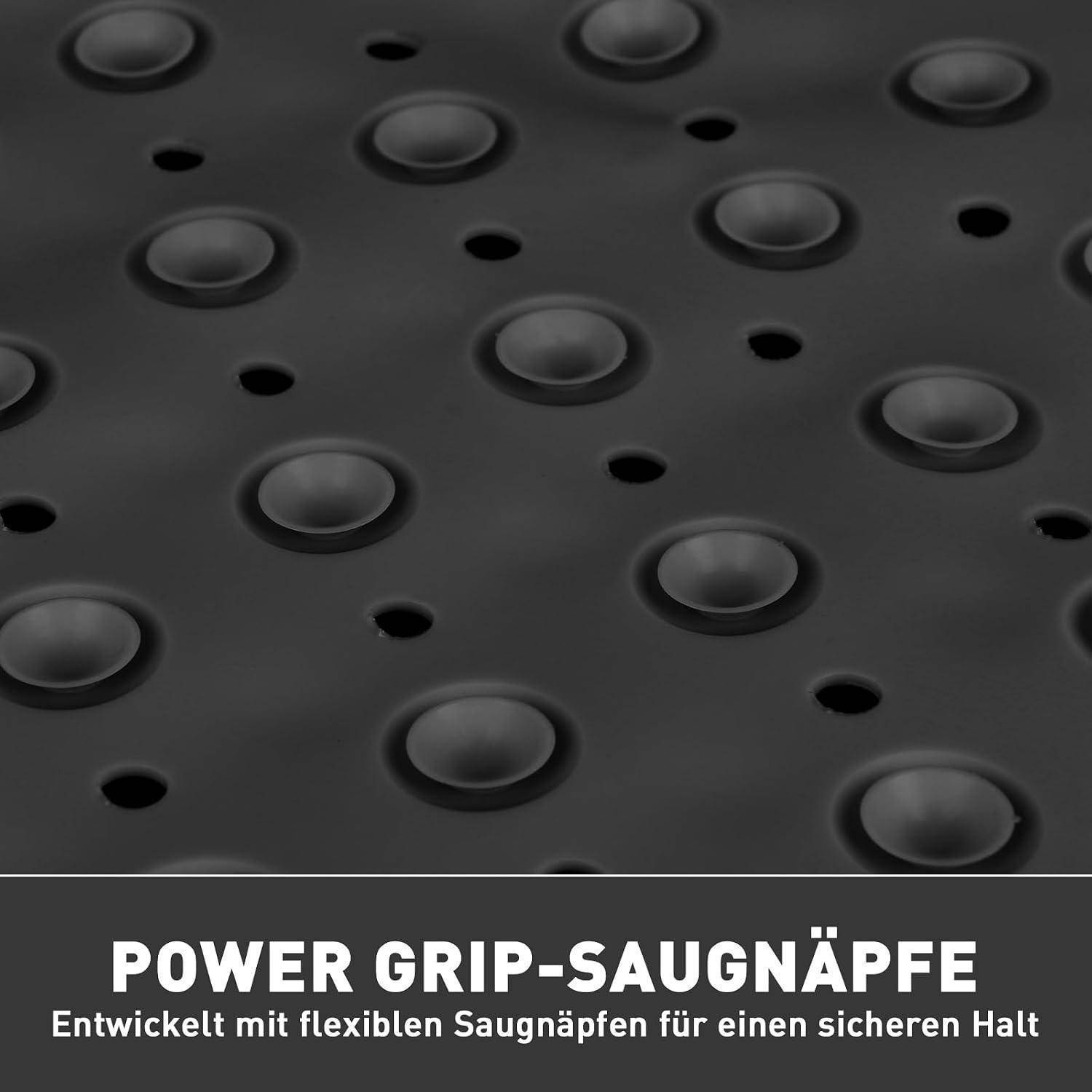 Schwarze perforierte Oberfläche mit erhabenen Saugnäpfen; Text sagt „POWER GRIP-SAUGNÄPFE" und „Entwickelt mit flexiblen Saugnäpfen für einen sicheren Halt"" und zeigt eine sichere Grifffunktion an.