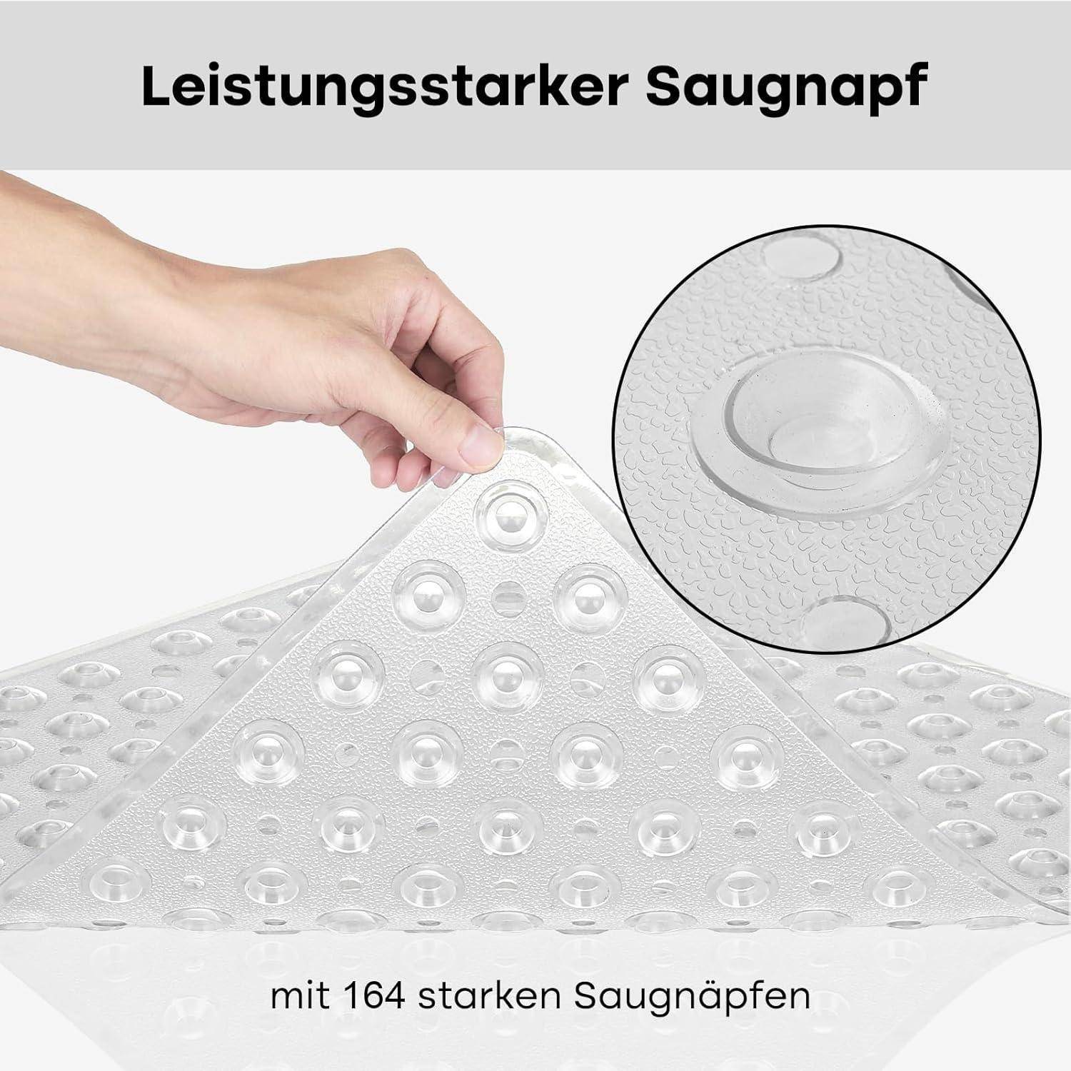 Transparente Antirutschmatte mit 164 Saugnäpfen, die von einer Hand hochgehoben wird; eingefügte Vergrößerung zeigt die Details der Saugnäpfe.