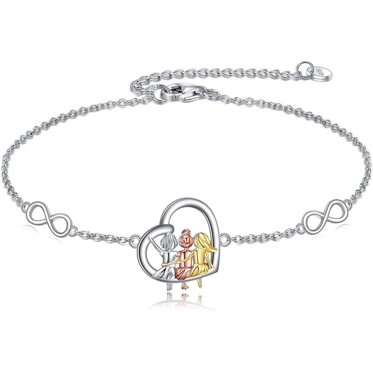Silberkettenarmband mit Unendlichkeitssymbolen und einem zentralen Engel-Charm mit drei Figuren in einem herzförmigen Rahmen.