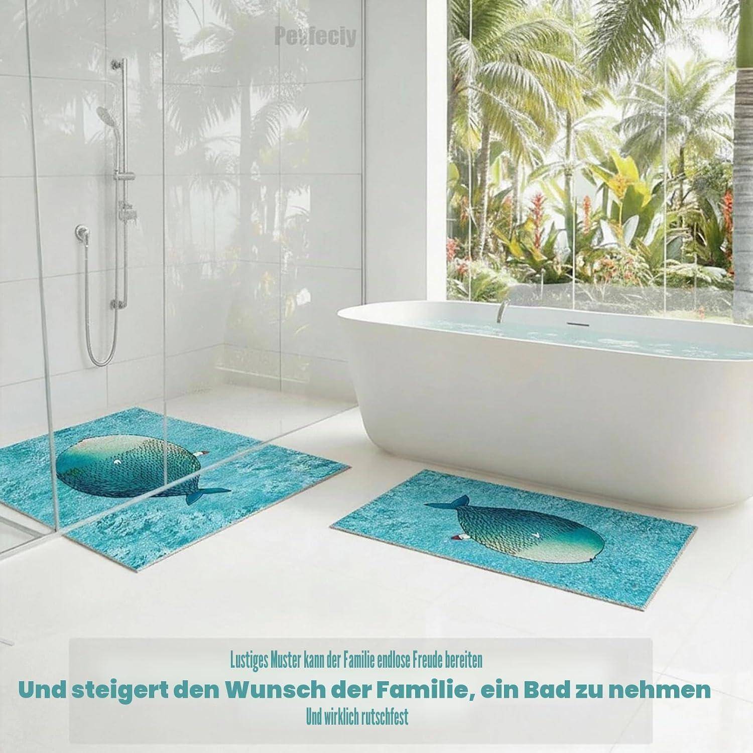 Modernes Badezimmer mit freistehender Badewanne und Glasdusche, mit zwei türkisfarbenen Wal-Design Badematten und deutschem Werbetext am unteren Ende.