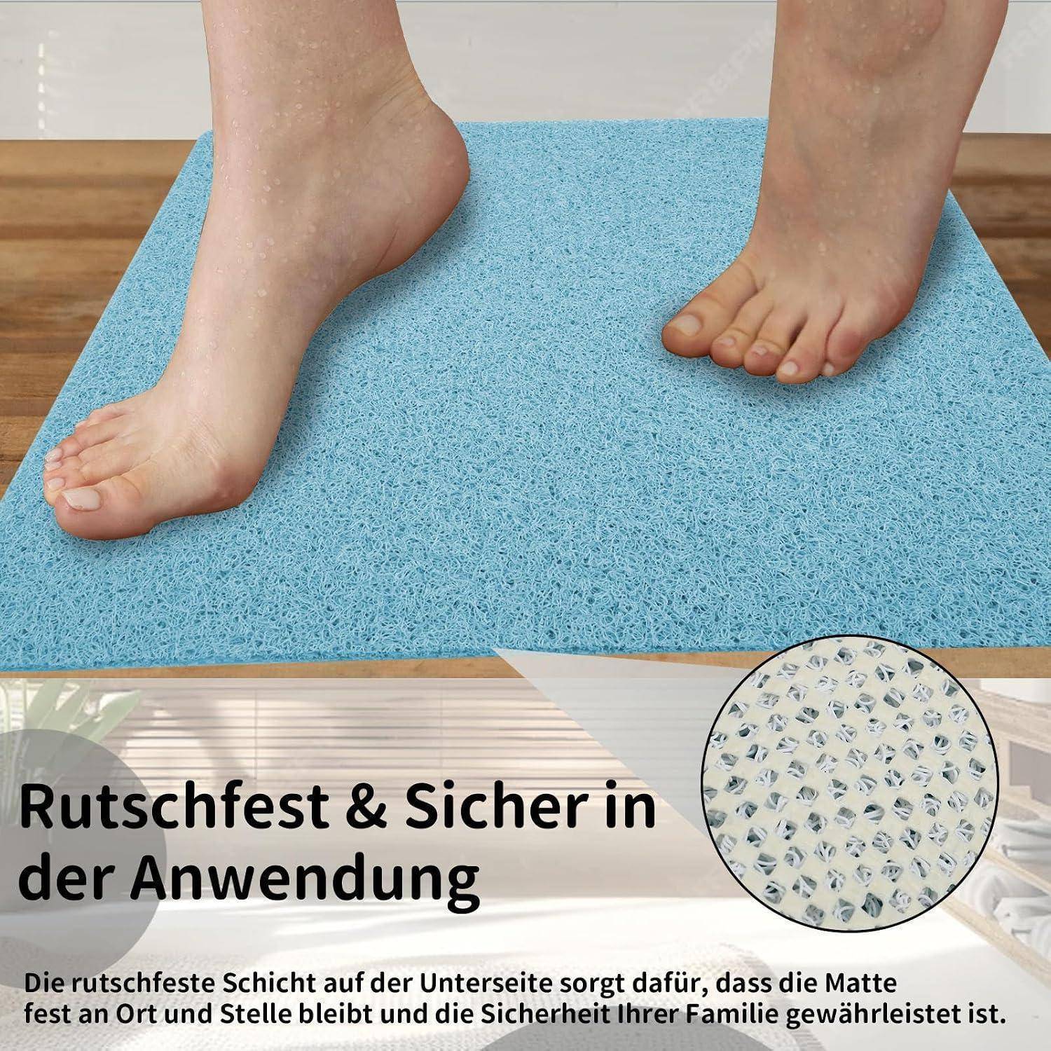 Füße stehen auf einer blauen rutschfesten Matte; deutscher Text besagt, dass sie rutschsicher und sicher in der Anwendung ist.