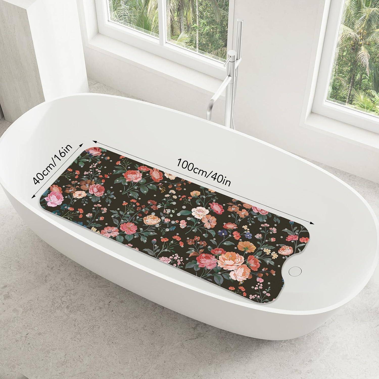Weiße ovale Badewanne mit einem Blumenbadematteneinsatz, beschriftet mit 100cm/40in Länge und 40cm/16in Breite, gezeigt in einem hellen Badezimmer.