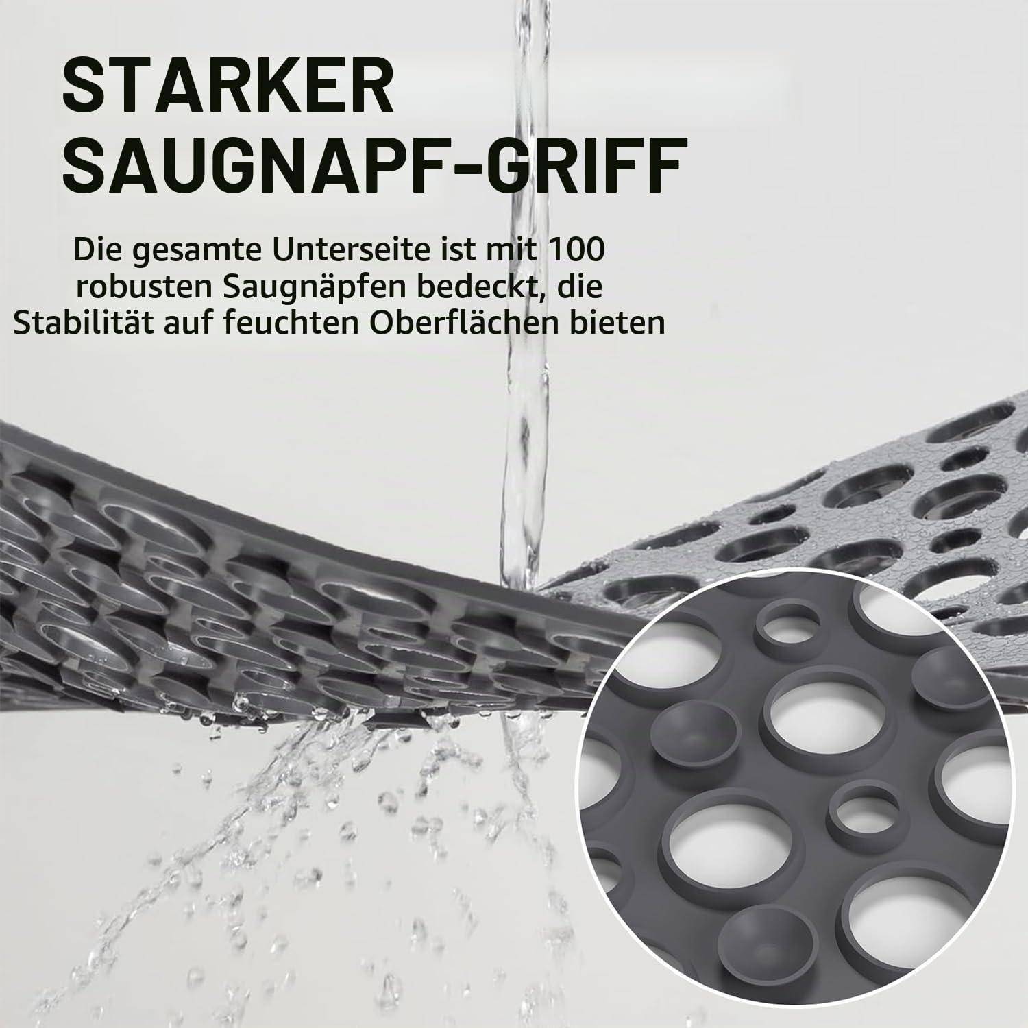 Werbebild zeigt eine graue rutschfeste Matte mit vielen Saugnapfen; deutscher Text lautet „STARKER SAUGNAPF-GRIFF