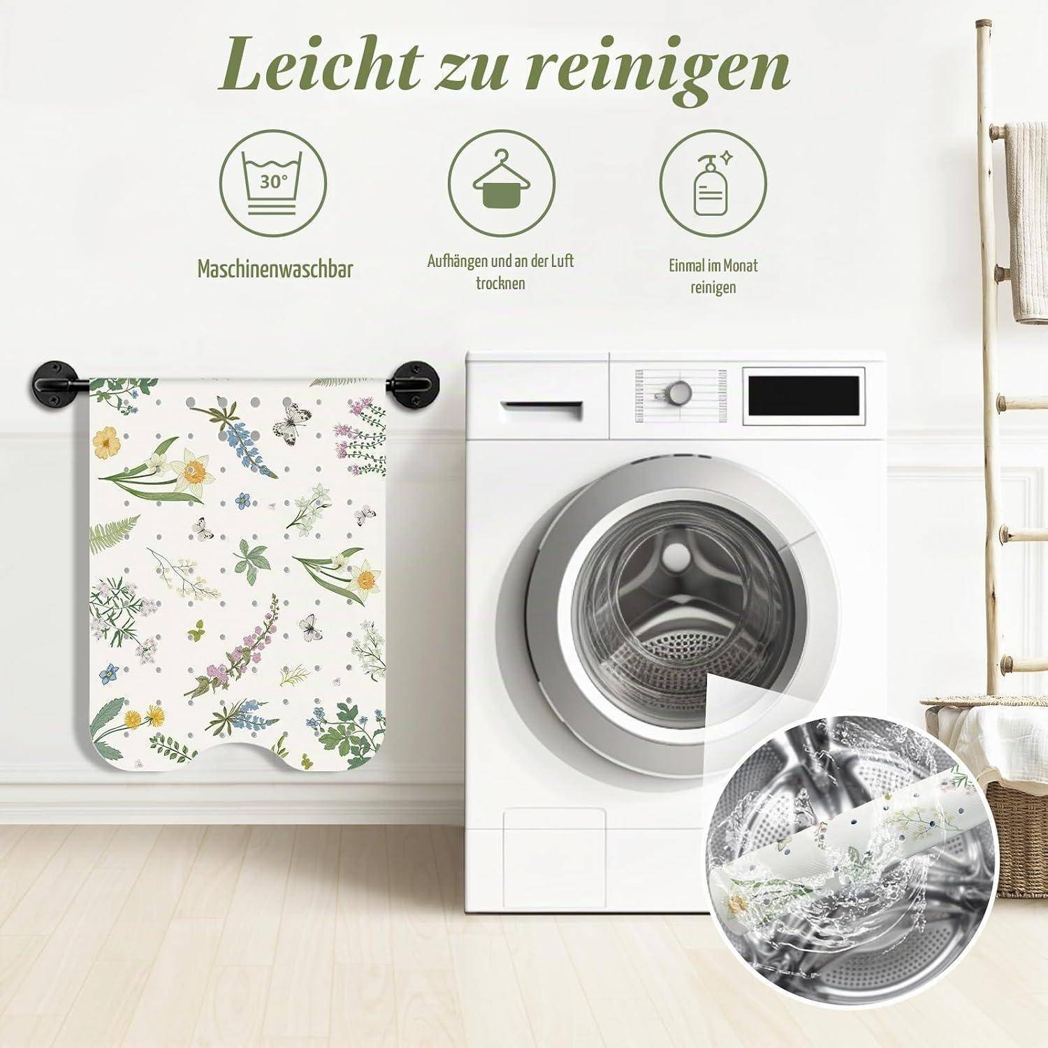 Werbebild einer Wäscheabdeckung mit Blumenmuster neben einer Frontlader-Waschmaschine, mit deutschem Text, der angibt, dass sie leicht zu reinigen ist, maschinenwaschbar, an der Luft zu trocknen und monatlich zu reinigen ist.