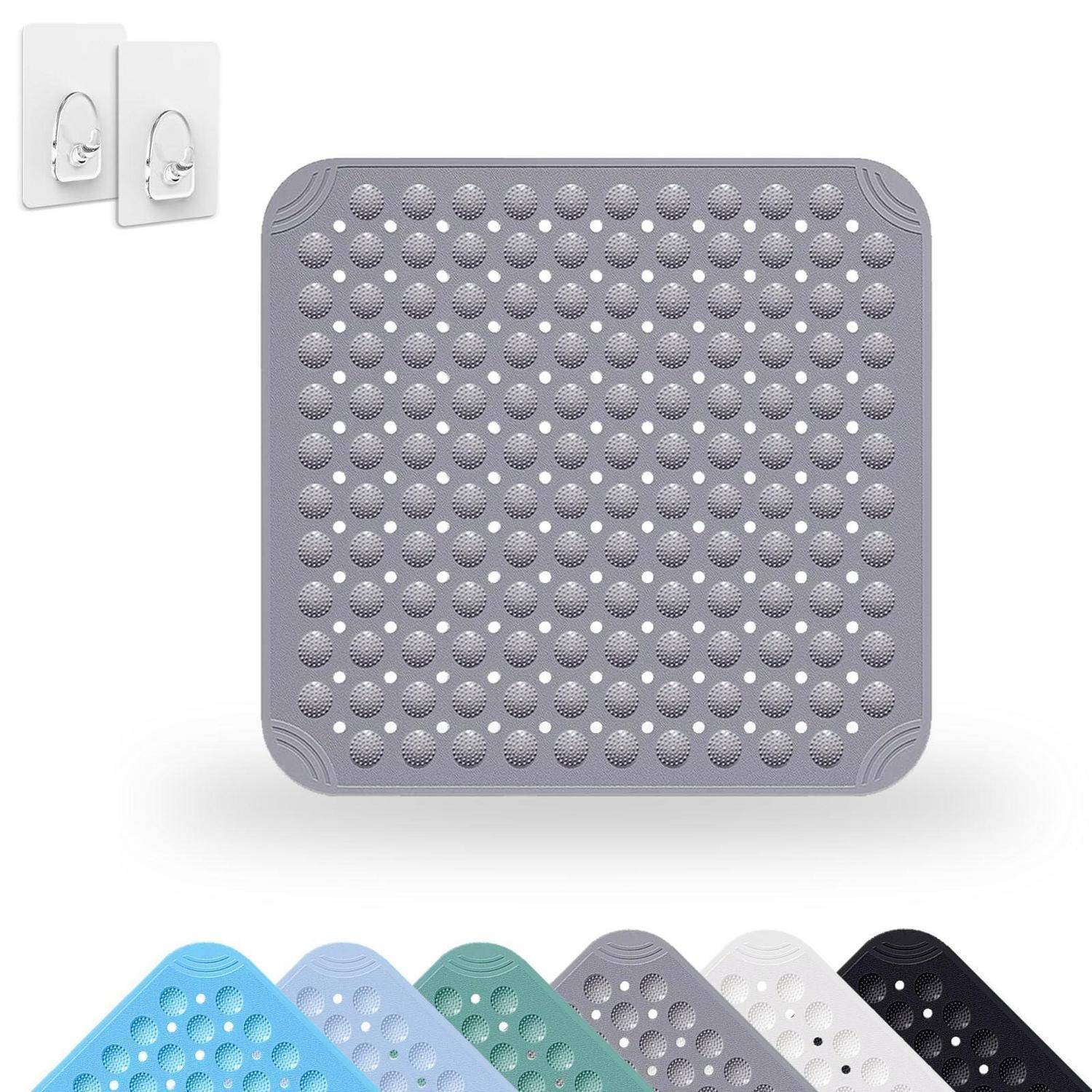 Graue perforierte Wandmatte mit quadratischem Muster und Saugnapfhaken; Farboptionen werden teilweise am unteren Rand angezeigt.