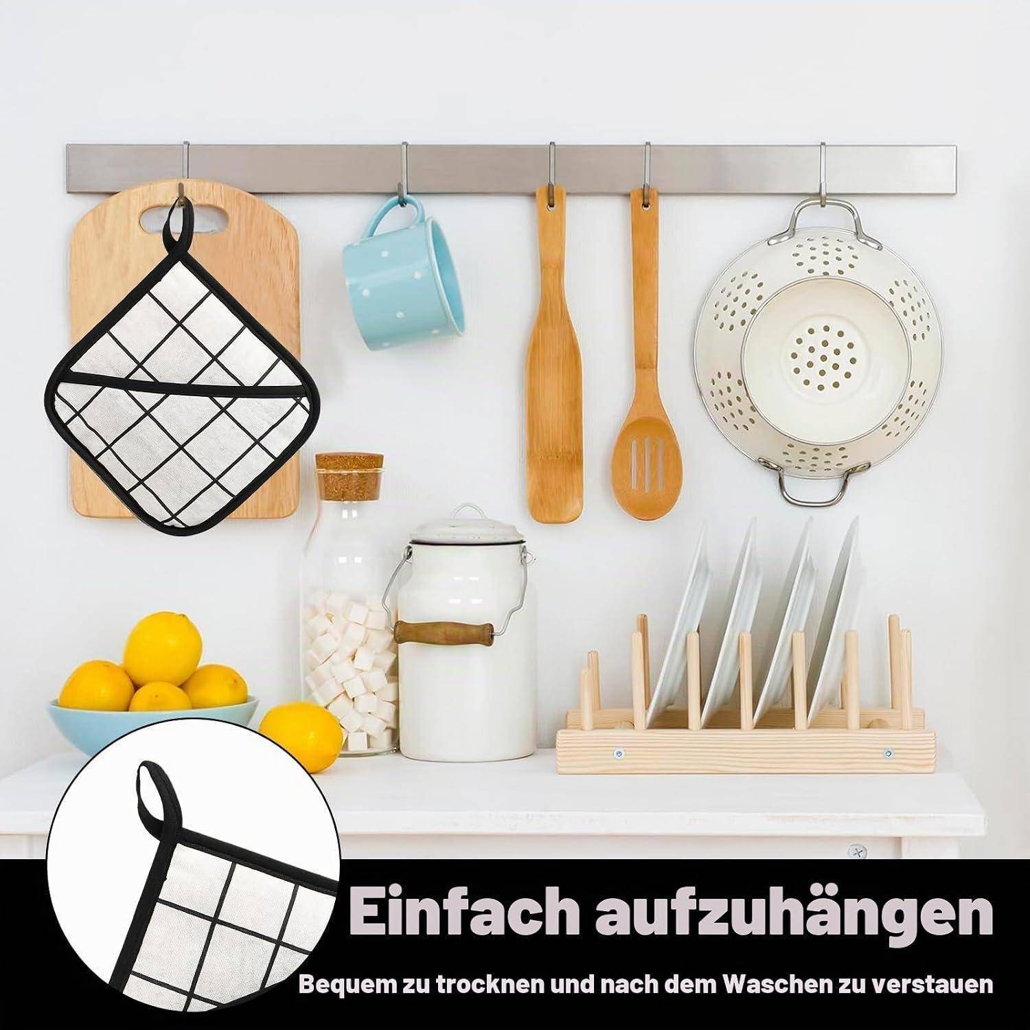 Küchenwerkzeuge und Utensilien hängen an einem Wandregal, mit dem Text „Einfach aufzuhängen