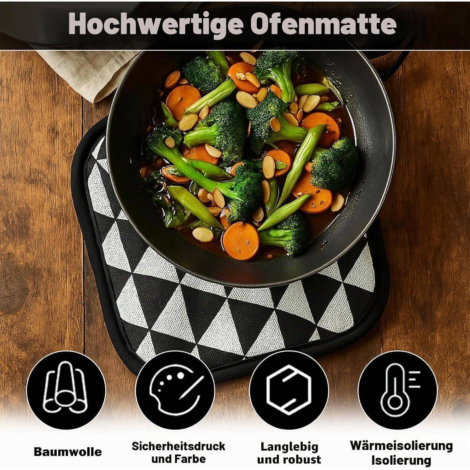 Ein Overhead-Foto einer schwarzen Bratpfanne mit Brokkoli, Karotten und Mandeln auf einem geometrischen Untersetzer; deutscher Text liest 