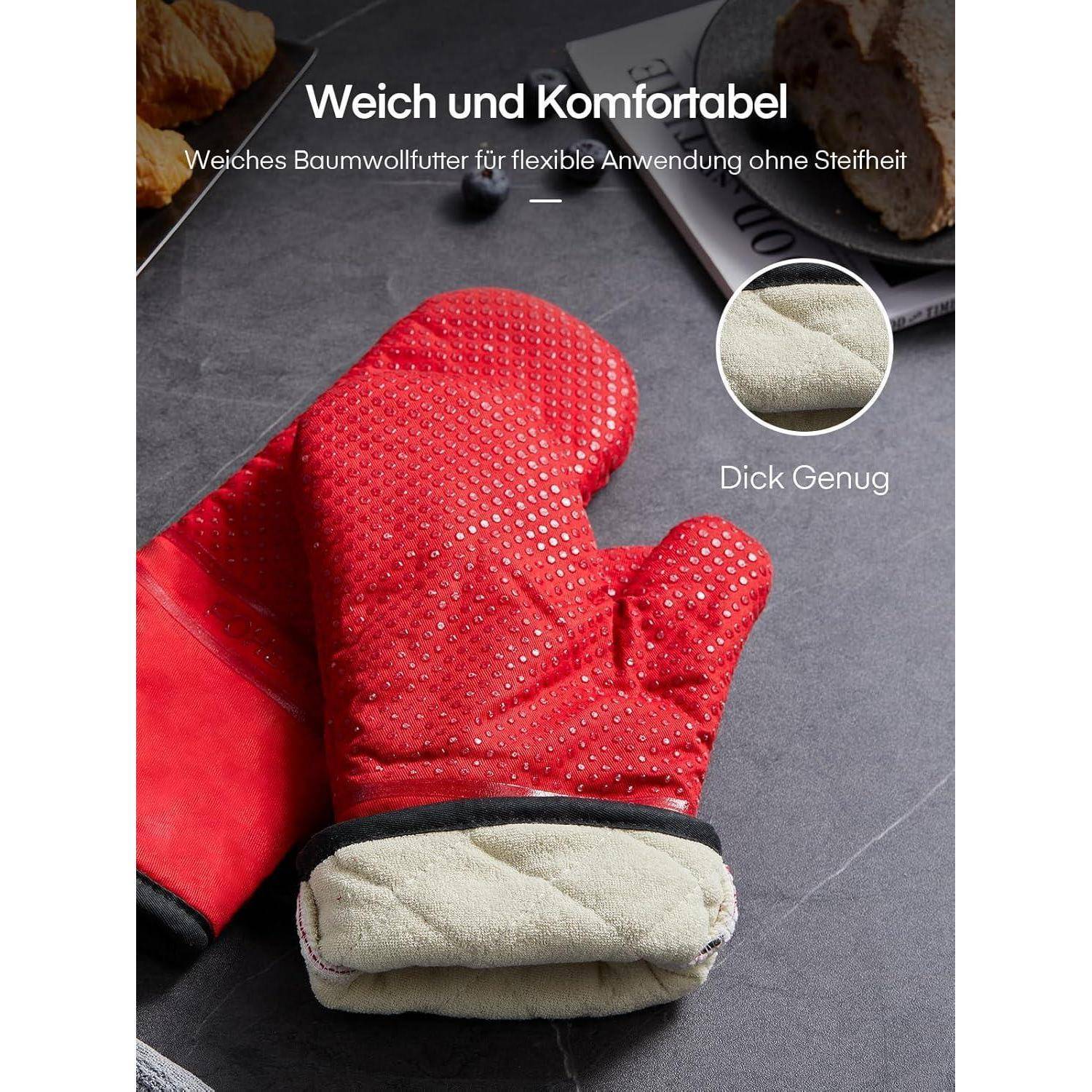 Roter isolierter Winterfäustling mit dicker weicher Baumwollauskleidung; deutscher Text besagt „Weich und Komfortabel