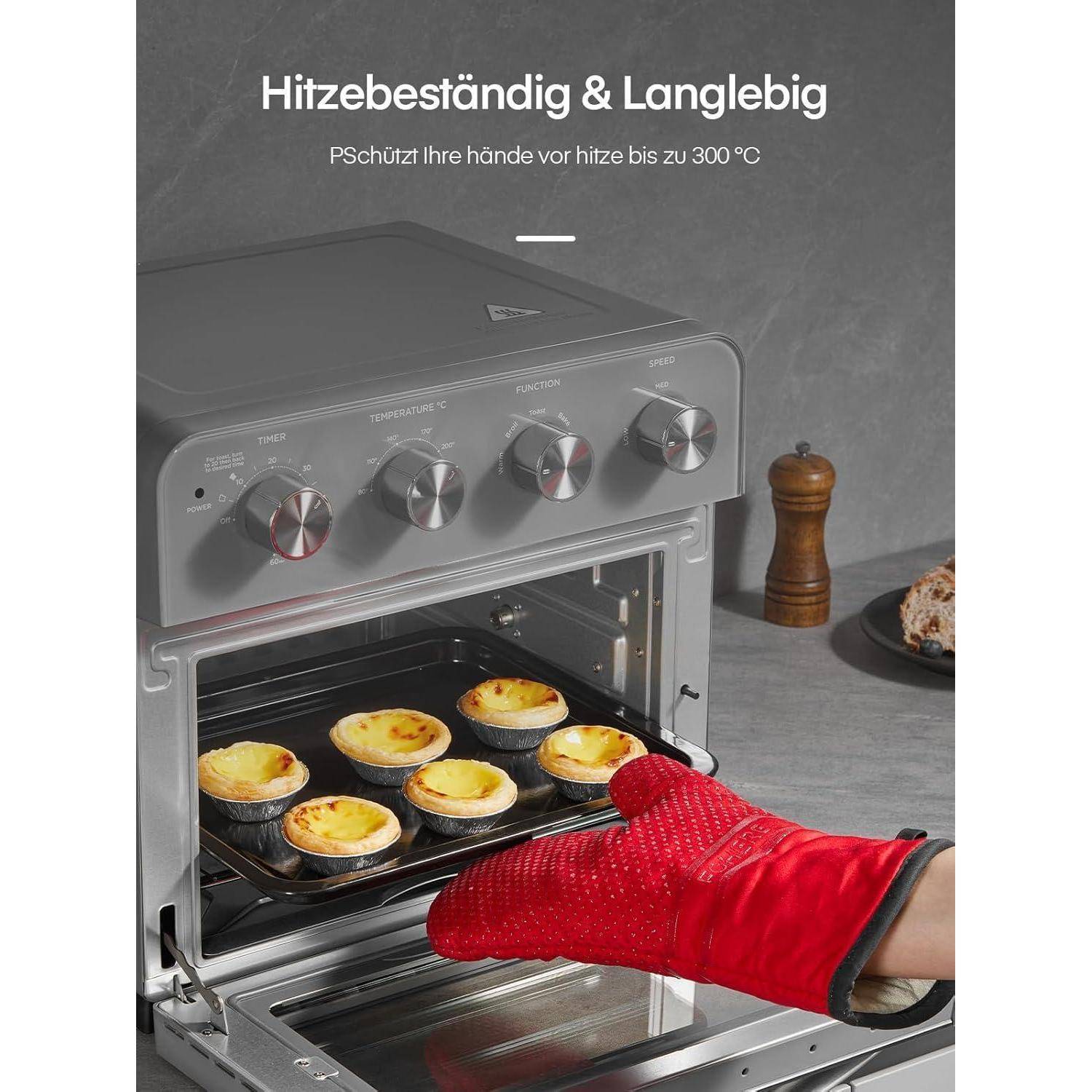 Textanzeige zeigt einen hitzebeständigen Ofenhandschuh, der ein heißes Tablett in einem beleuchteten Ofen hält; die Überschrift lautet „Hitzebeständig & Langlebig