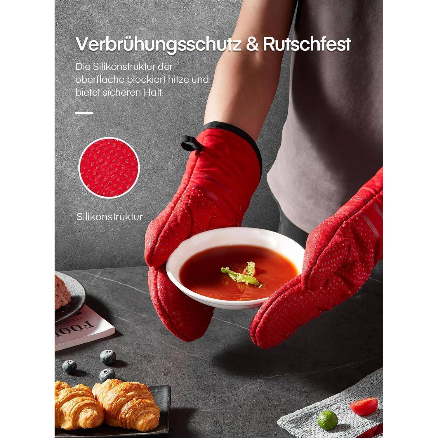 Rote Ofenhandschuhe mit Silikongriff halten eine heiße Schüssel; deutscher Text sagt 'Brandschutz und rutschfest' und 'Silikonstruktur'.