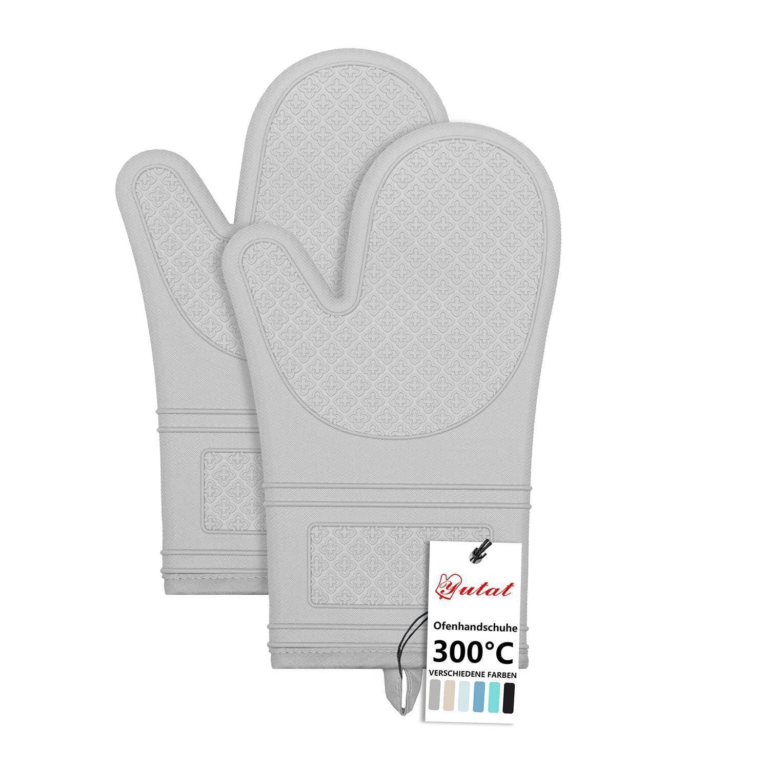 Paar grauer Ofenhandschuhe mit einem hängenden Produktetikett mit der Beschriftung „300°C