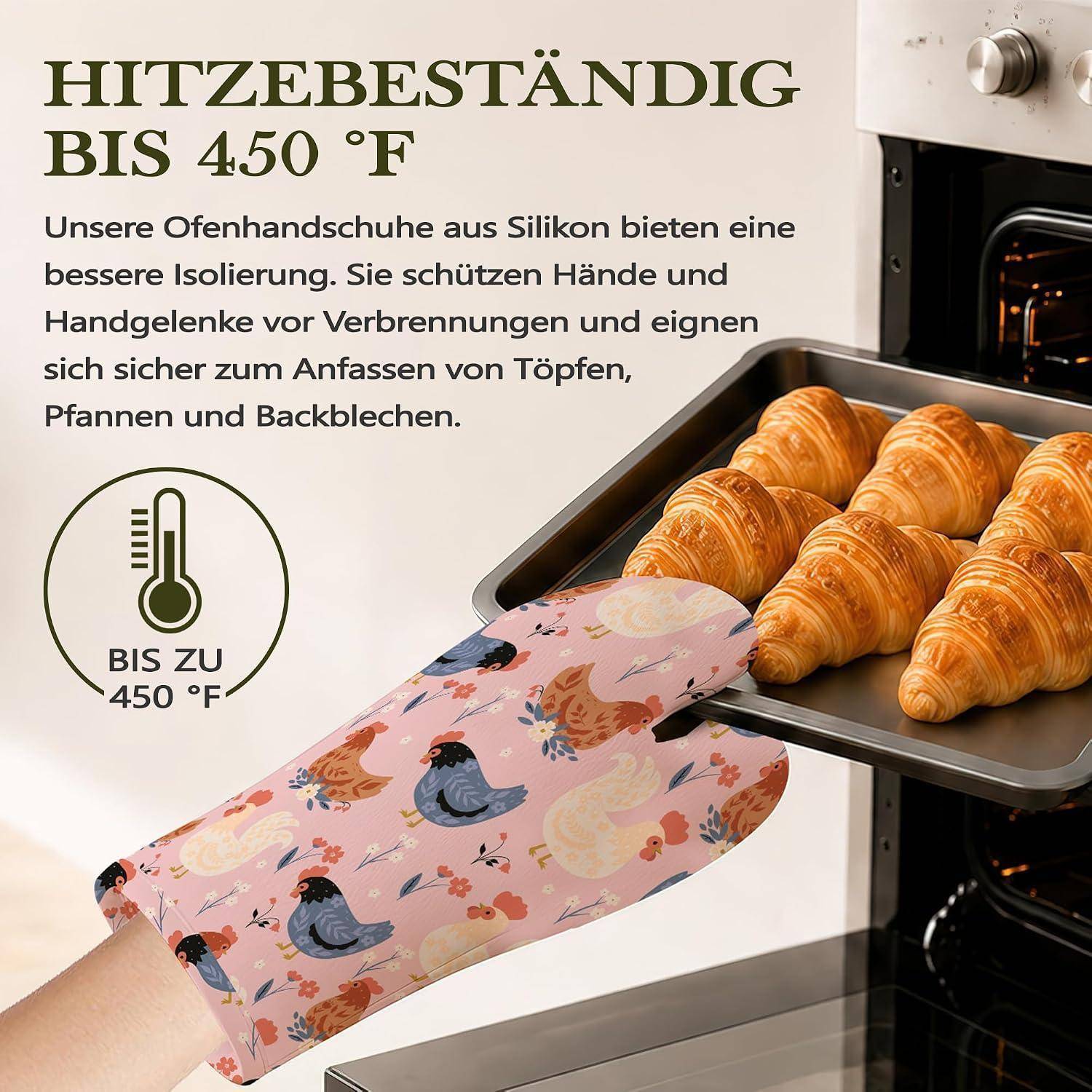 Hitzbeständig bis 450°F – Silikon-Ofenhandschuhe mit einer Hand, die ein heißes Backblech mit Croissants aus dem Ofen nimmt.