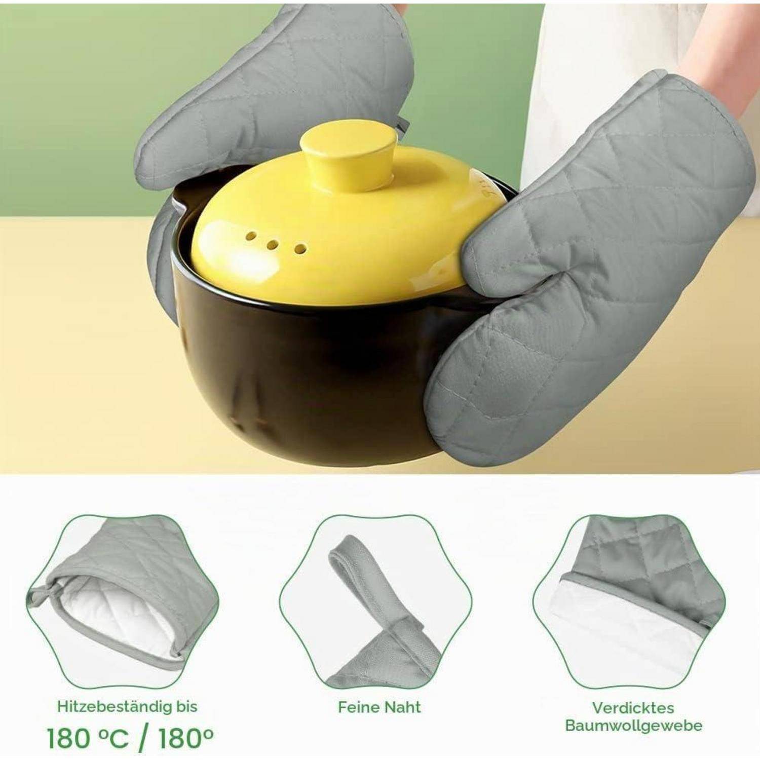 Graue Ofenhandschuhe halten einen kleinen schwarzen Topf mit gelbem Deckel; darunter sind drei Funktionsmerkmale aufgeführt: hitzebeständig bis 180°C, feiner Saum, verstärkt gewebter Baumwollstoff.