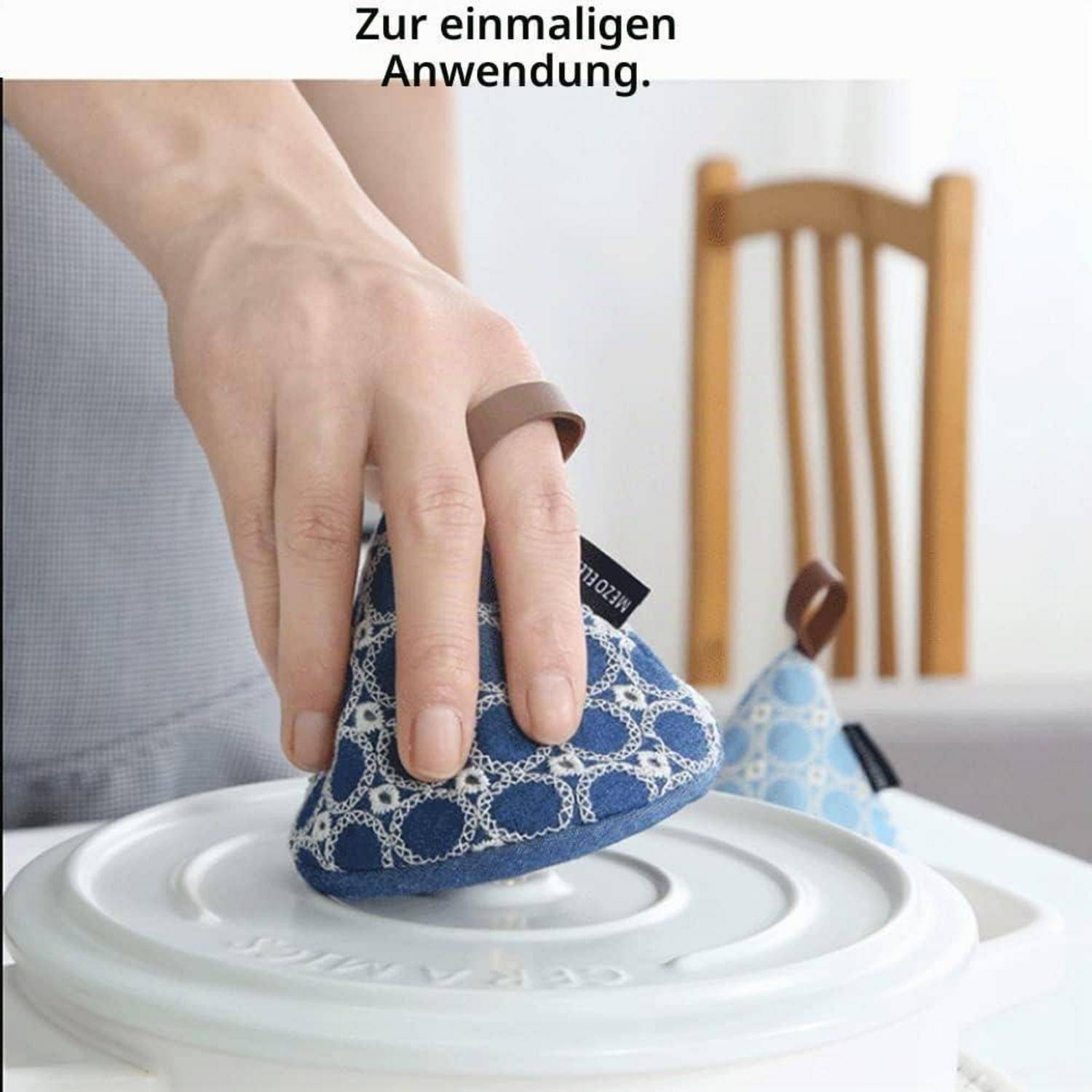 Jemand legt ein wiederverwendbares Tuch über einen weißen Lebensmittelbehälterdeckel; deutscher Text liest 