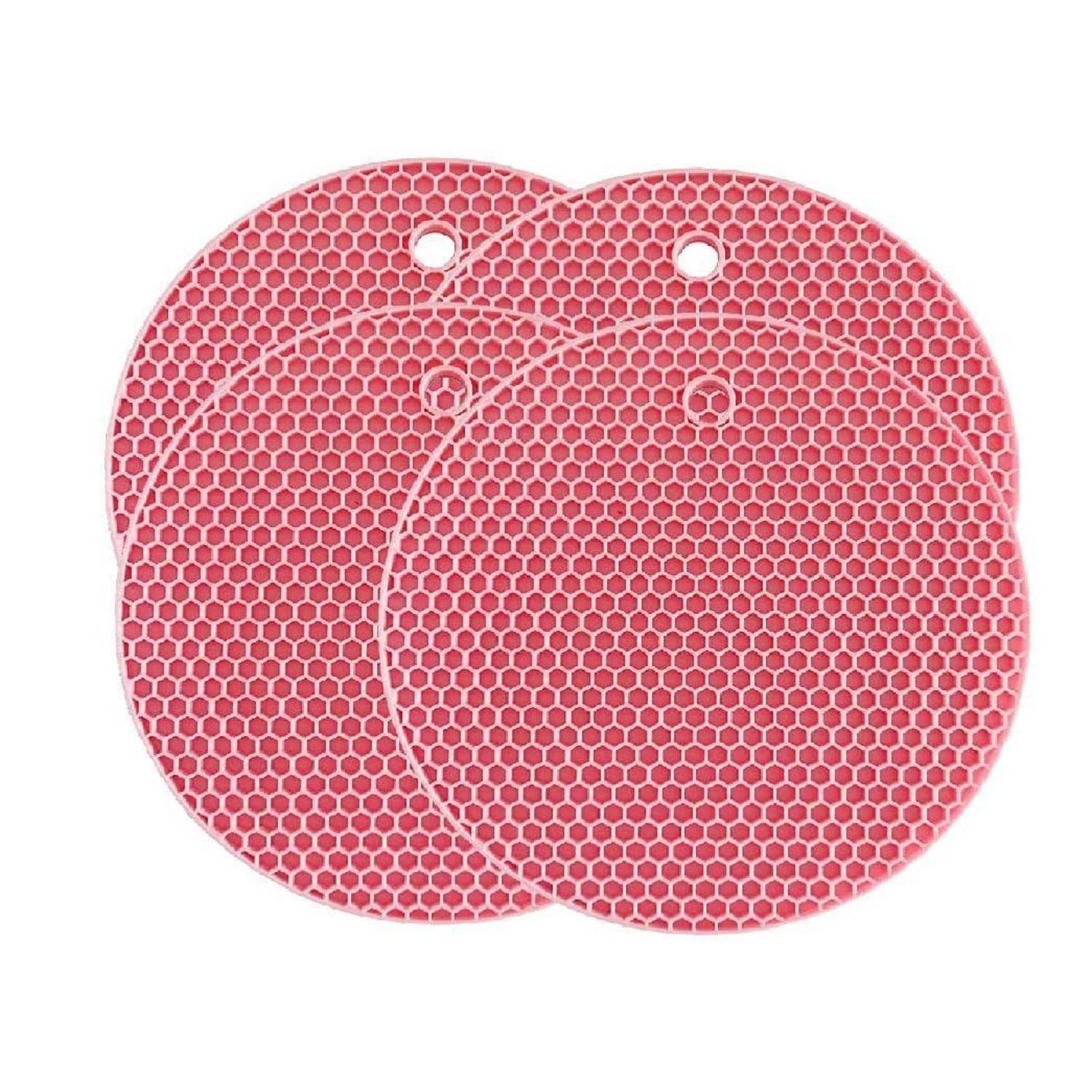 Zwei sich überlappende runde rosa Wabenmuster-Scheiben mit kleinen Aufhängelöchern oben, auf weißem Hintergrund dargestellt.