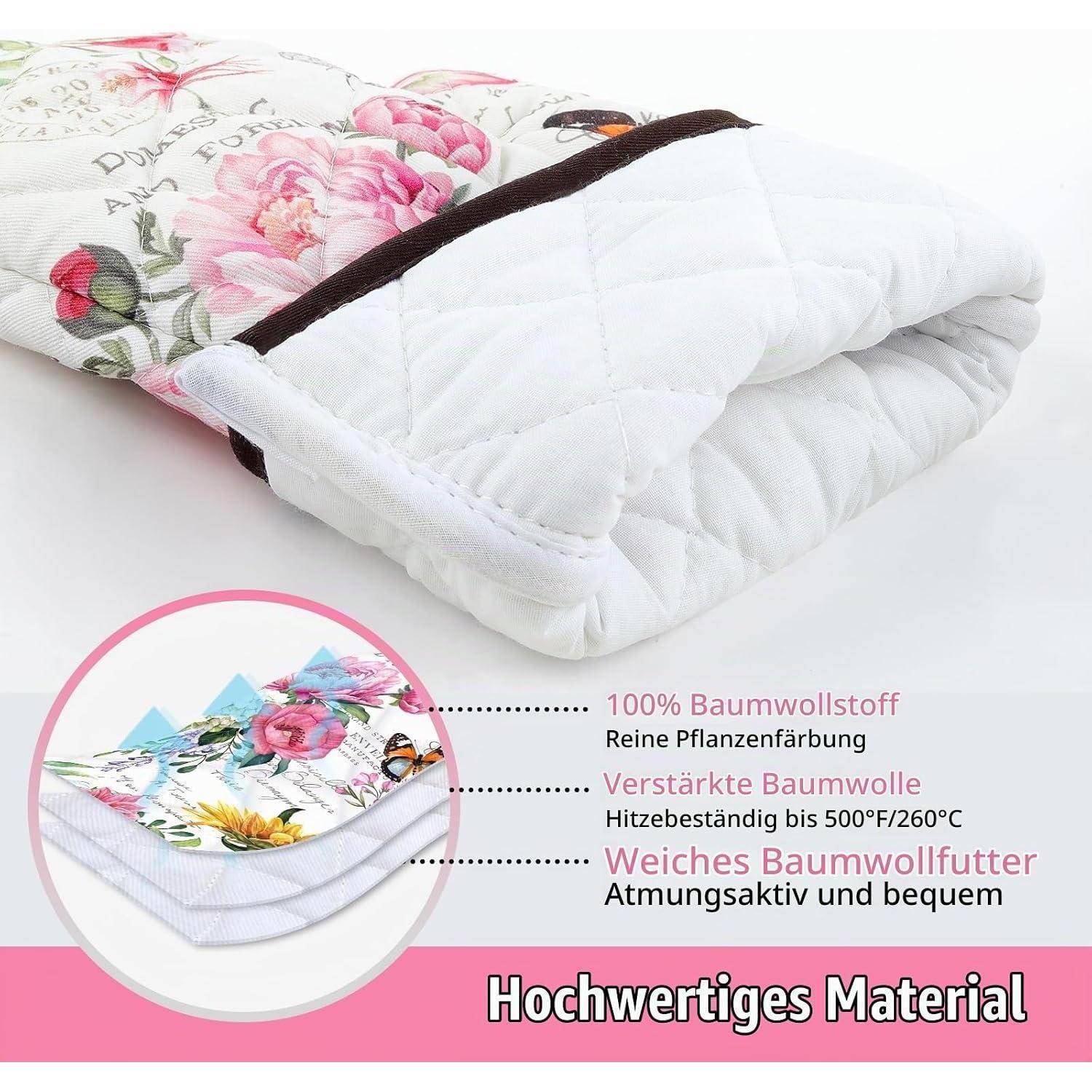 Werbebild eines gesteppten weißen Kissens oder Matratzenauflage mit floraler Baumwollbezug und deutschem Text, der 