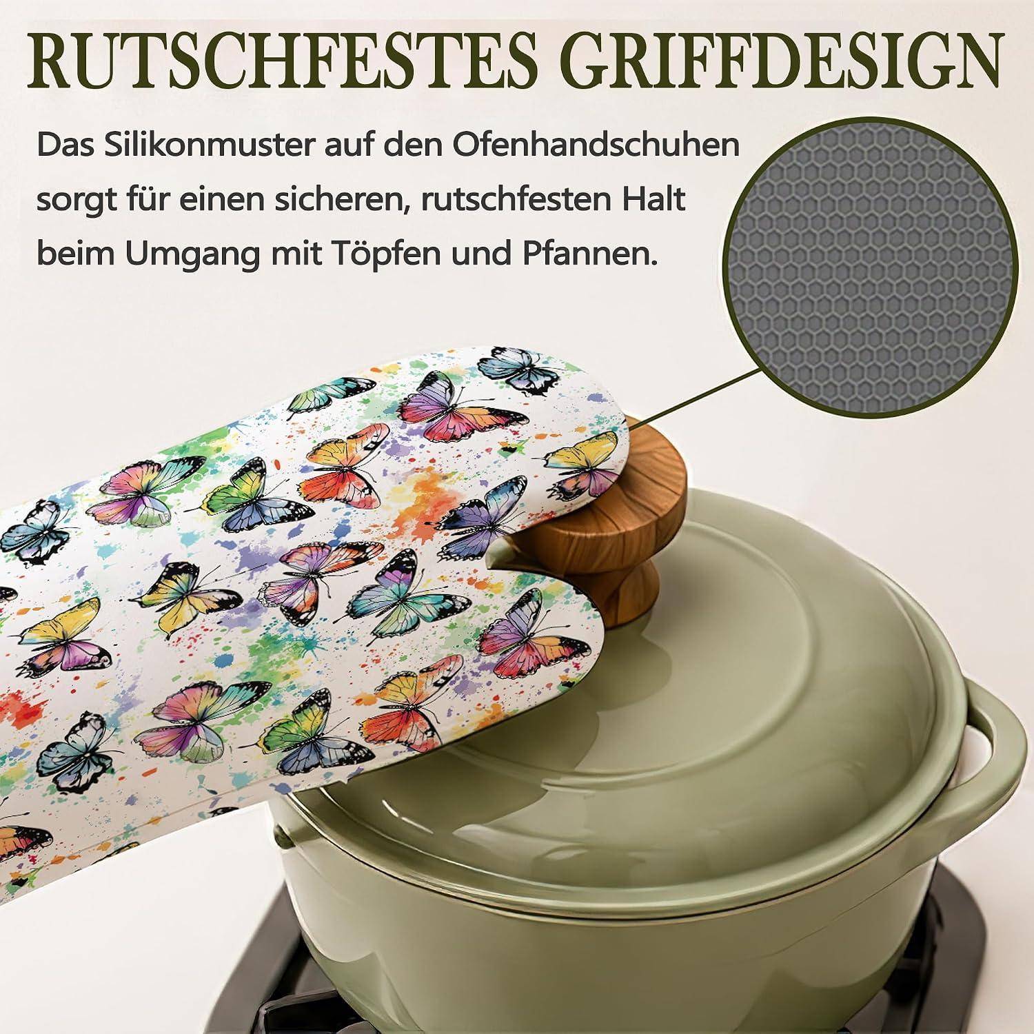Ofenhandschuhe aus Silikon mit Schmetterlingsmuster greifen einen grünen Topf mit Deckel; die Ausschnittsansicht zeigt die strukturierte rutschfeste Oberfläche. Der Text besagt „Rutschfestes Griffdesign