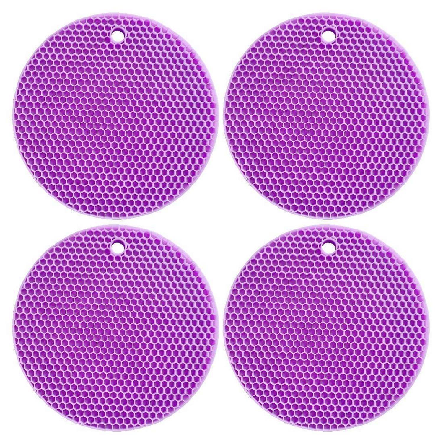 Vier runde violette Mesh-Reinigungspads mit kleinen Aufhängelöchern, angeordnet in einem 2x2-Raster auf weißem Hintergrund.