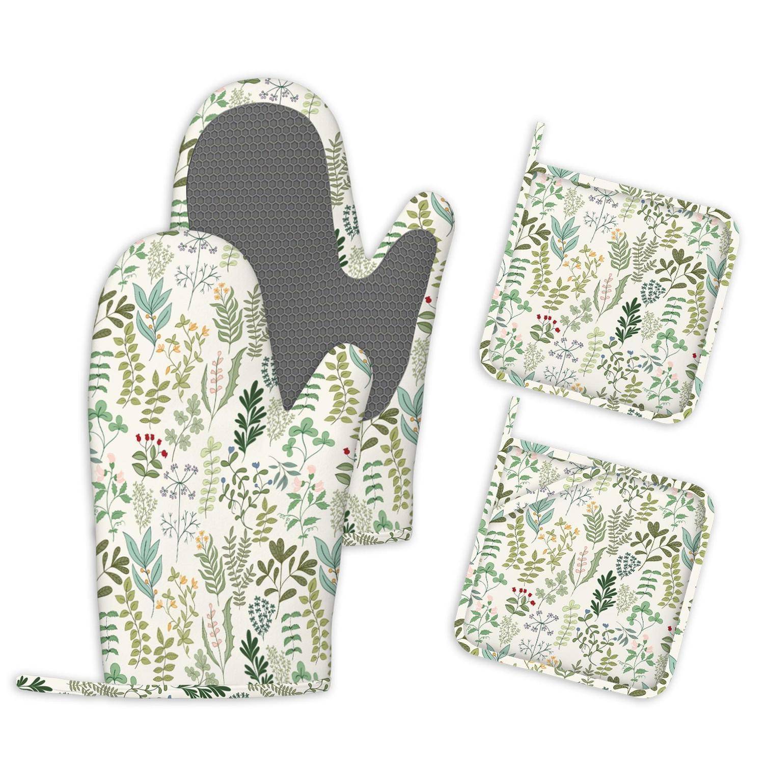 Ofenhandschuh mit Blumenmuster und zwei passende quadratische Topflappen auf weißem Hintergrund.