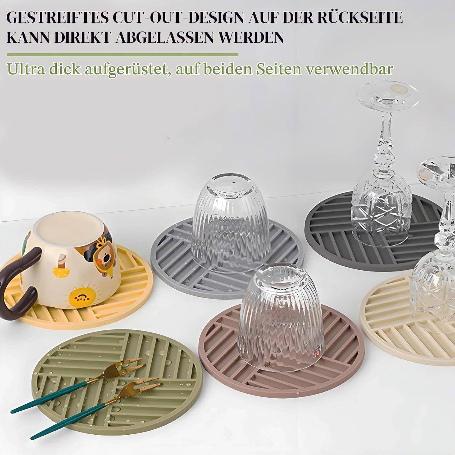 Werbebild von gestreiften ausgestanzten Untersetzen mit Tassen und Gläsern; der Text besagt, dass sie extra dick sind, auf beiden Seiten verwendbar und von der Rückseite abnehmbar sind.